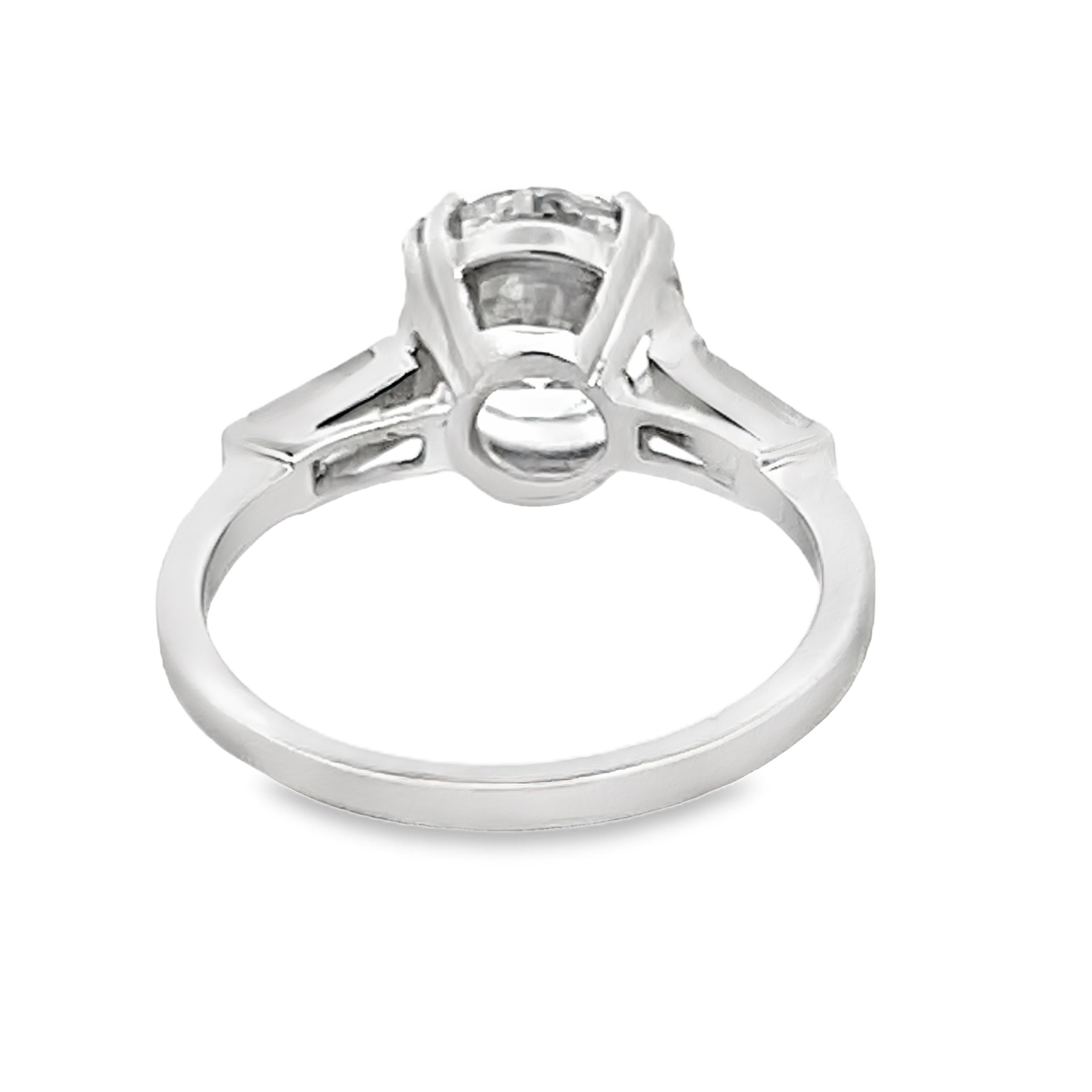 Round Cut Mid-Century Platinum Engagement Ring with 2.50 Ct Diamond and Baguette Accents For Sale