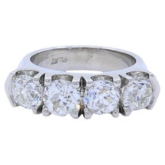 Mid-Century Platinum Four-Stone Diamond Ring