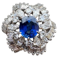 Mid-Century Platinum Sapphire 
Diamond Cluster Ring
