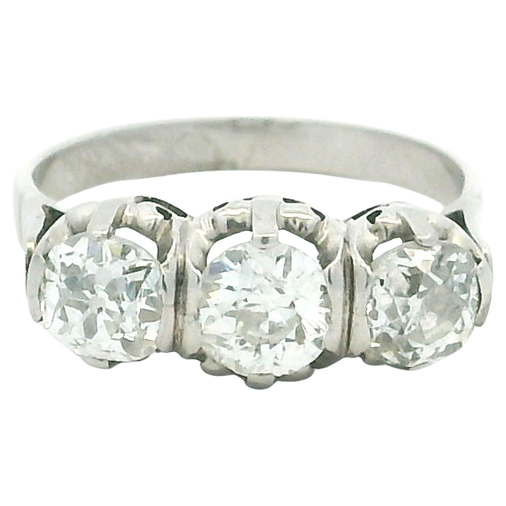 Mid-Century Platinum Three-Stone Diamond Ring, 2.10 Carats, Circa 1940–1950
