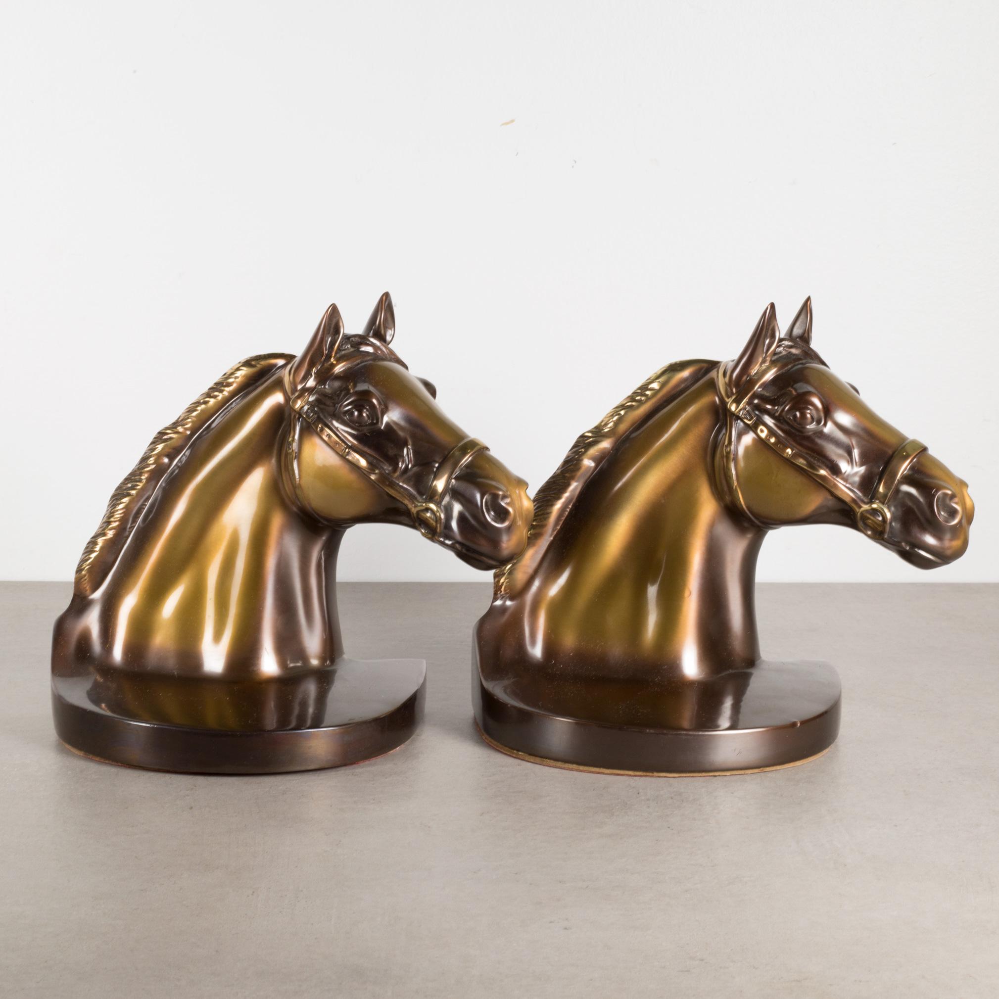 A pair of brass plated brass horse bookends. 
Original felt and lables. 
Made by Philadelphia Manufacturing Co. (PMC)
Good condition: no chips.