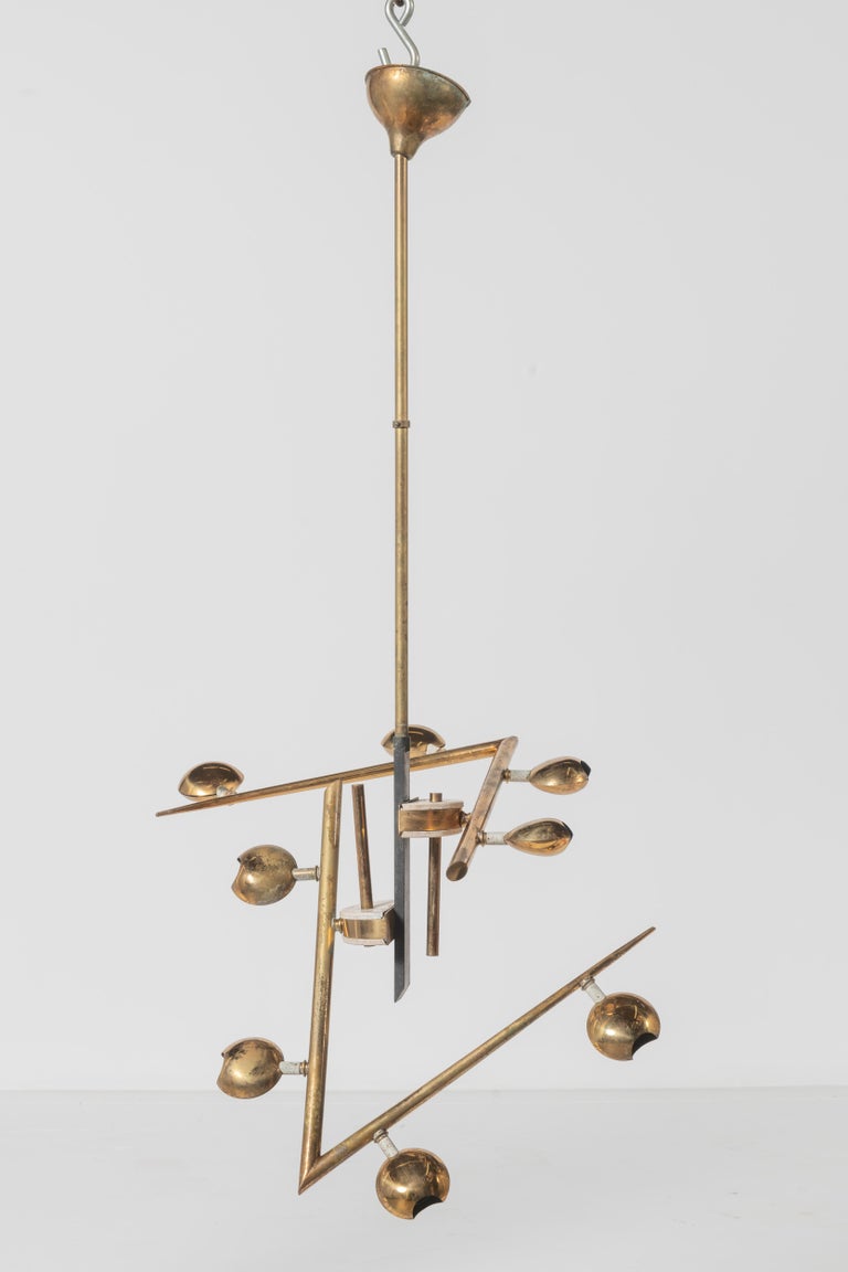 Rare Mid-Century Modern Italian pendant in polished brass and lacquered metal.