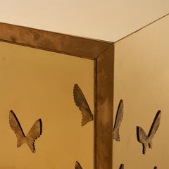 Mid-Century Polished Brass Cabinet with Butterfly Appliques and Brass Legs