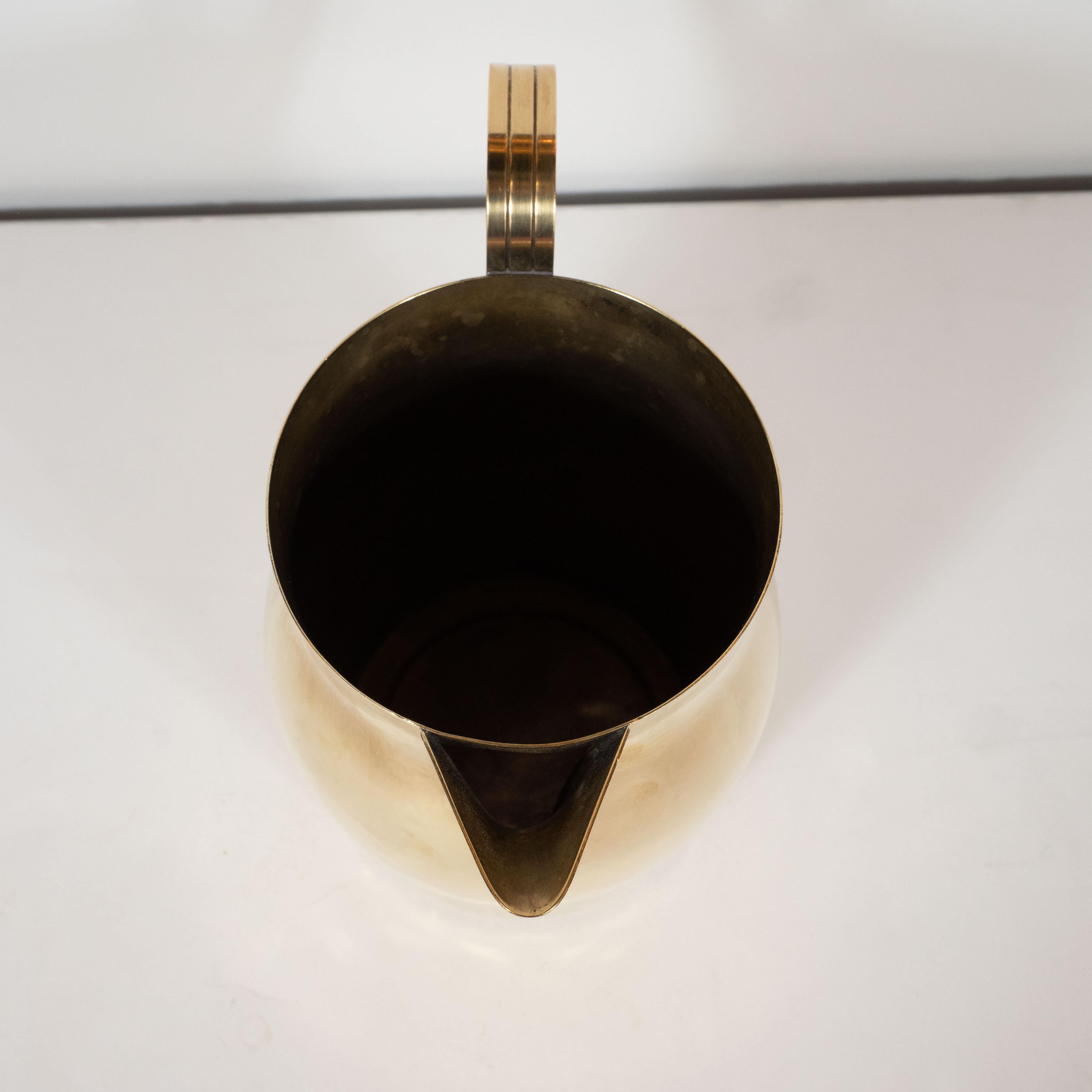 Mid-20th Century Midcentury Polished Brass Pitcher by Tommi Parzinger for Dorlyn Silversmiths