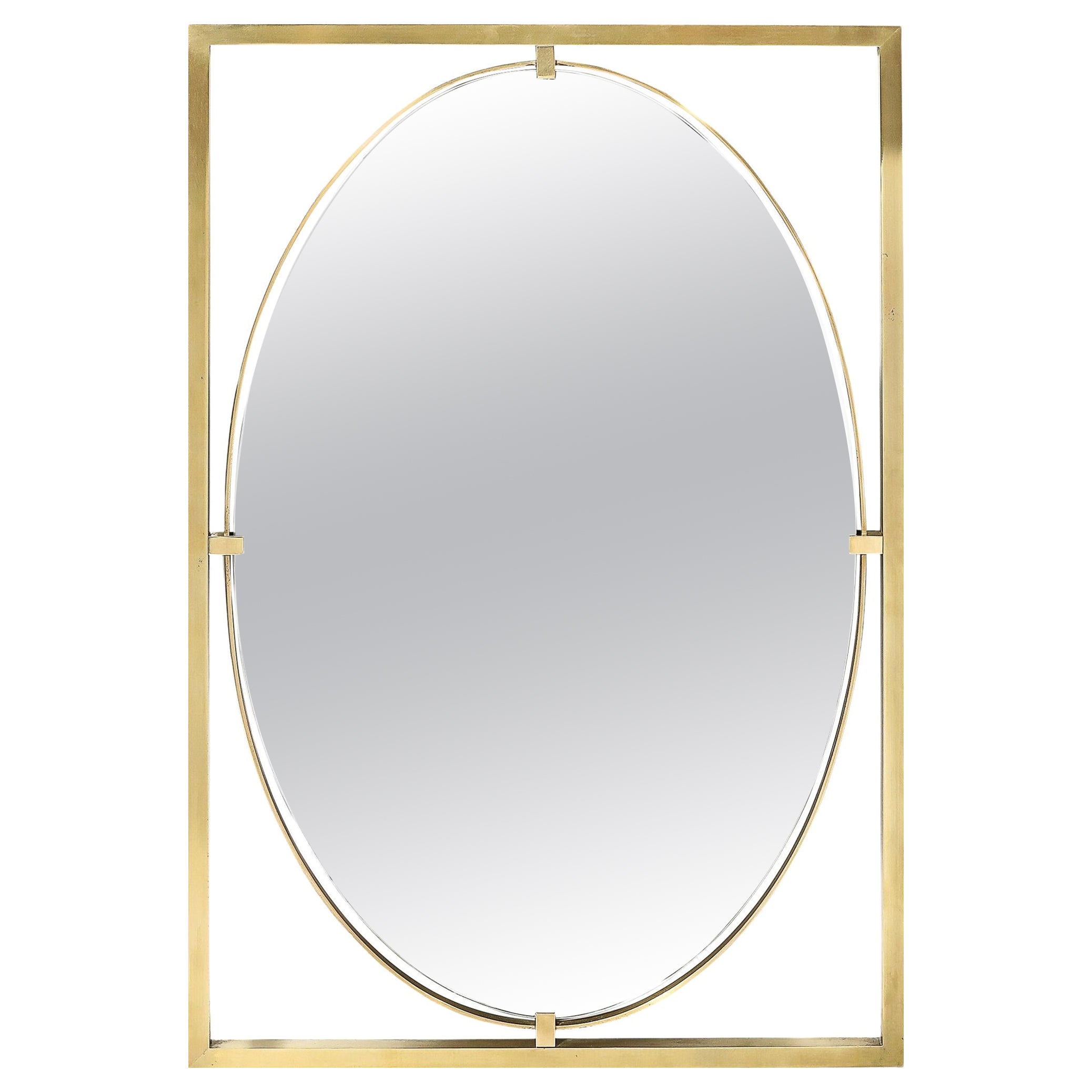 Mid-Century Polished Brass Rectilinear Open Frame Oval Mirror by John Widdicomb