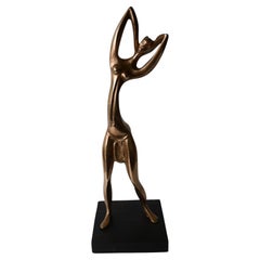 Mid-century Polished brass stylised africanist statue Hagenhauer style