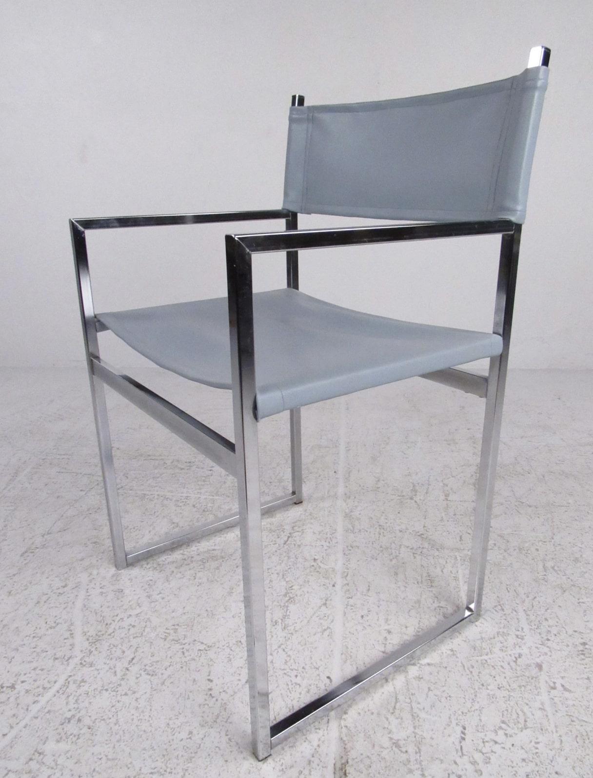 Stylish set of six dining or conference chairs in polished chrome with vinyl seats and backs. Designed in the style of a directors chair, they offer comfort and simple elegance.
Please confirm item location (NY or NJ).

 
