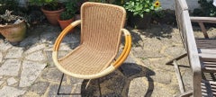 Mid century poly rattan and bamboo shell chair