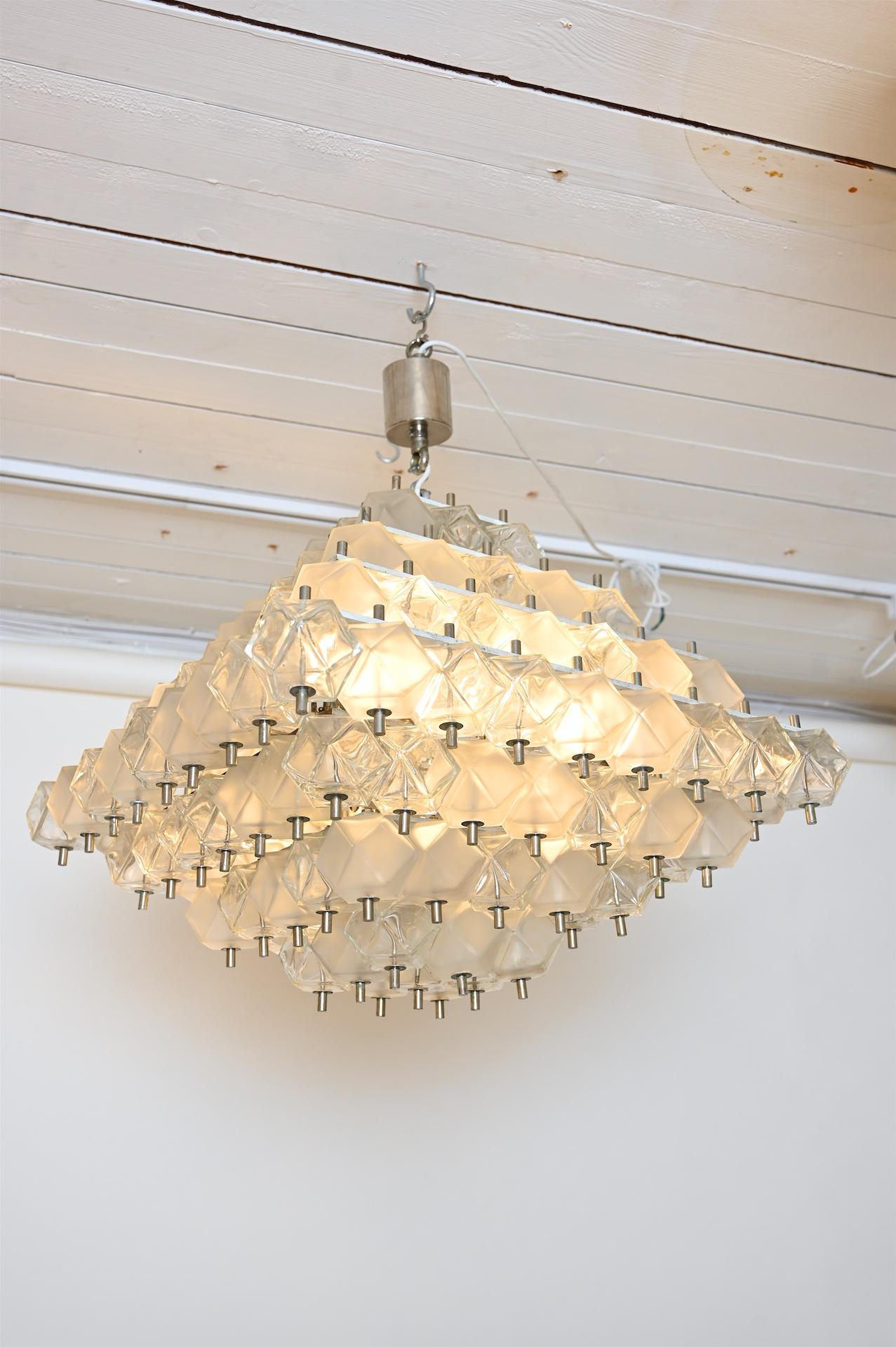 Original polyhedron chandelier with nickel accents, Italy, circa 1960

Each polyhedron with clear and etched glass sides

Drop can be extended with chain.