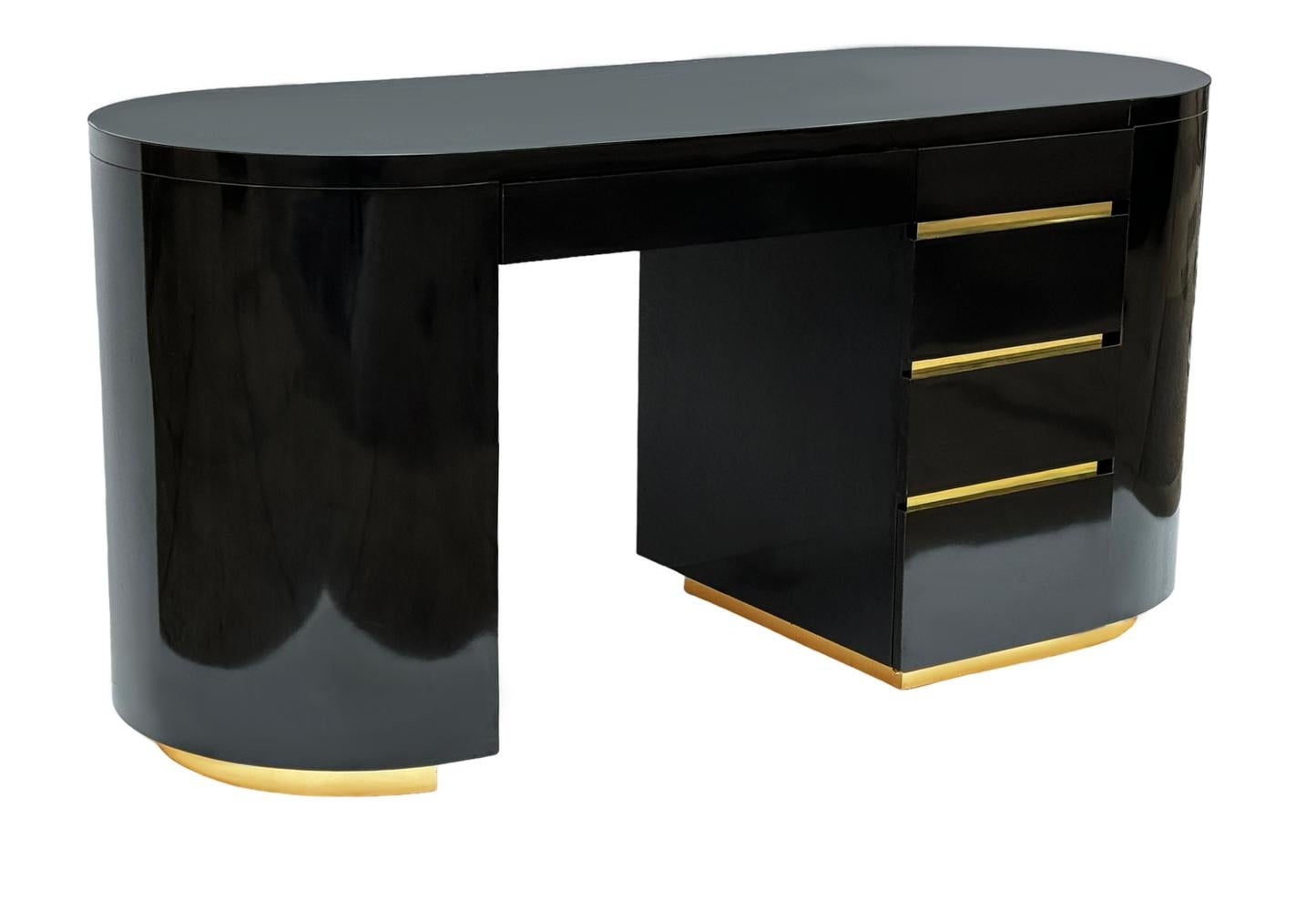 A simple modern nod to the art deco period. This desk features glossy black laminate with brass accents. Probably Italian circa 1980's. Nice clean original condition. 