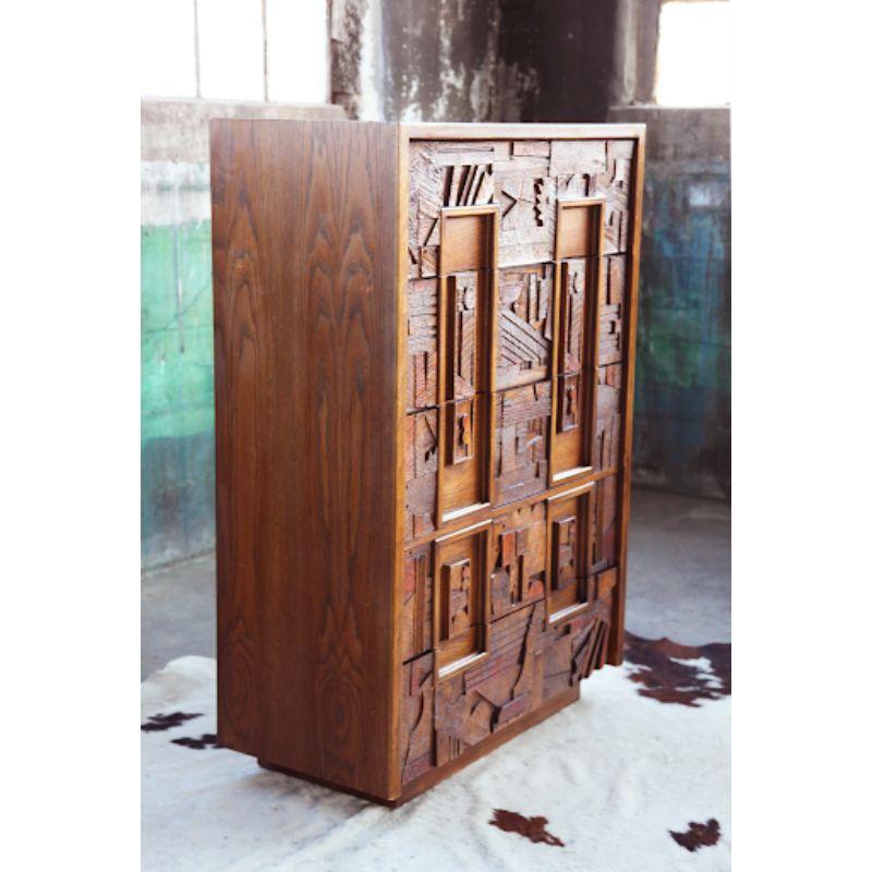 Absolutely awesome, unique and stunningly made Brutalist 5 drawer tall dresser or storage unit, with hand carved details unique to the 70s era. This piece is a hard one to find of the series. This can be used as a large dresser, bar, or storage