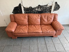 Mid century post modern danish thick orange leather 3 seat pillow sofa
