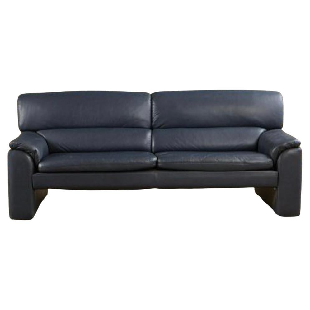 Fabulous Mid century style post modern two-cushion dark Navy blue Italian sofa - Circa. 1990s. Soft beautiful Leather in great condition. Ready for use. Made in Italy - Located in Brooklyn 

Measurements 72” Long x 32” deep x 30” High.