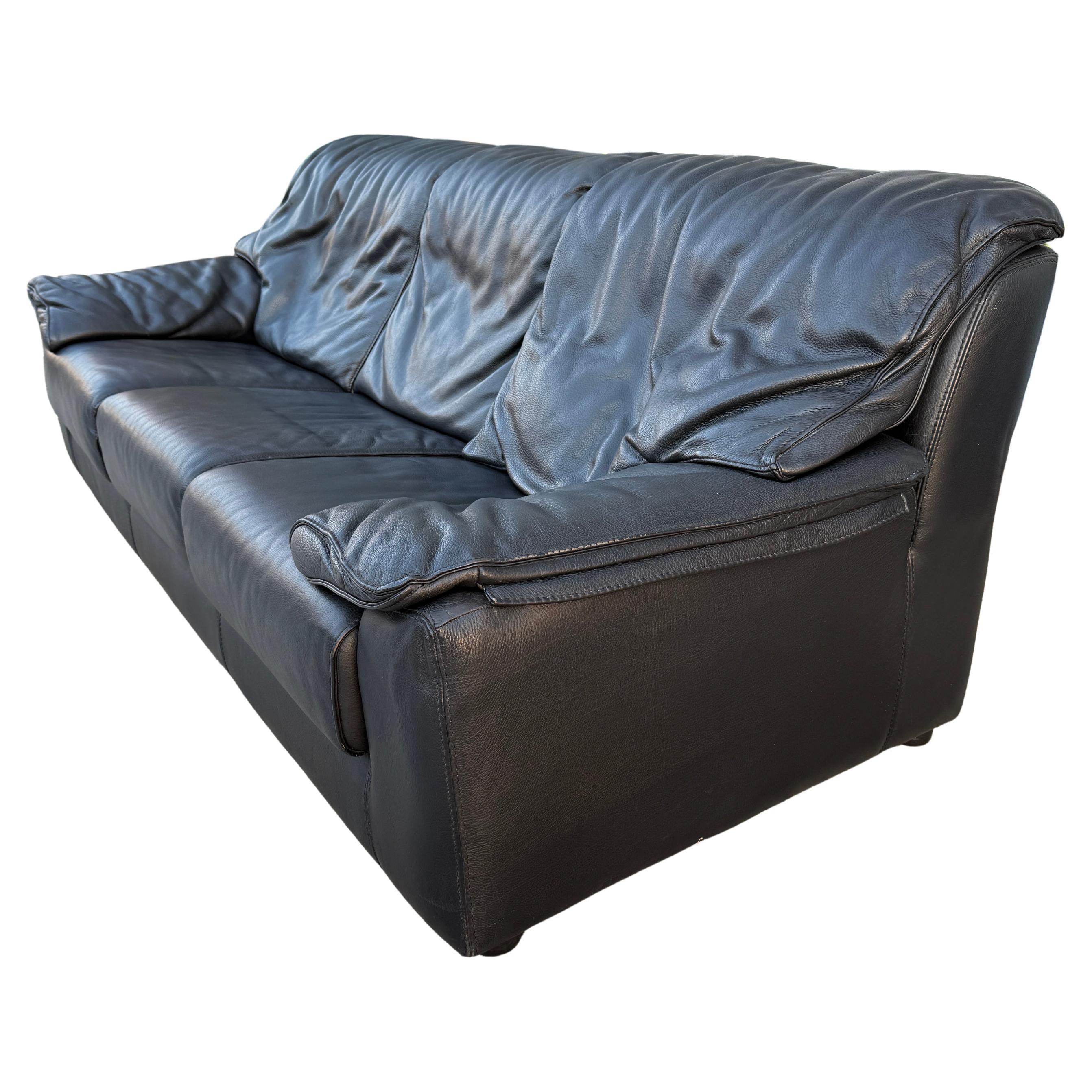Mid century post modern Italian thick black leather 3 seat sofa clean. Very clean sofa amazing thick black leather. Fold over pillow back and side cushions. Ready for use. Made in Italy.

Located in Brooklyn NYC

Sofa measures 84” x 36” x 32” high