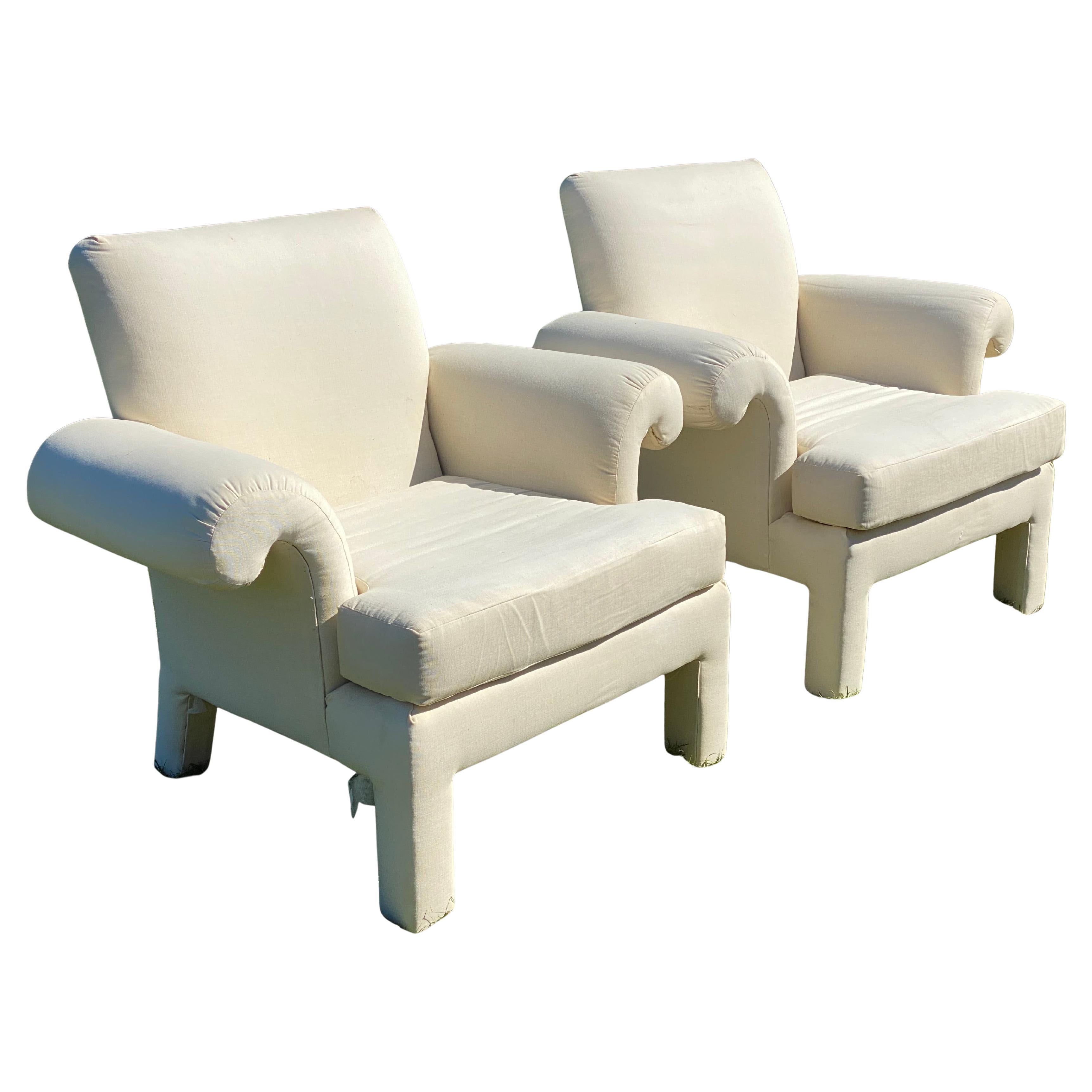Mid Century Post Modern Lounge Chairs by Donghia for Kroehler After Parsons.
A handsome matching pair of armchairs designed by Donghia for Kroehler, They are in good overall condition, keep them as they are or customize them in a fabric to suit your