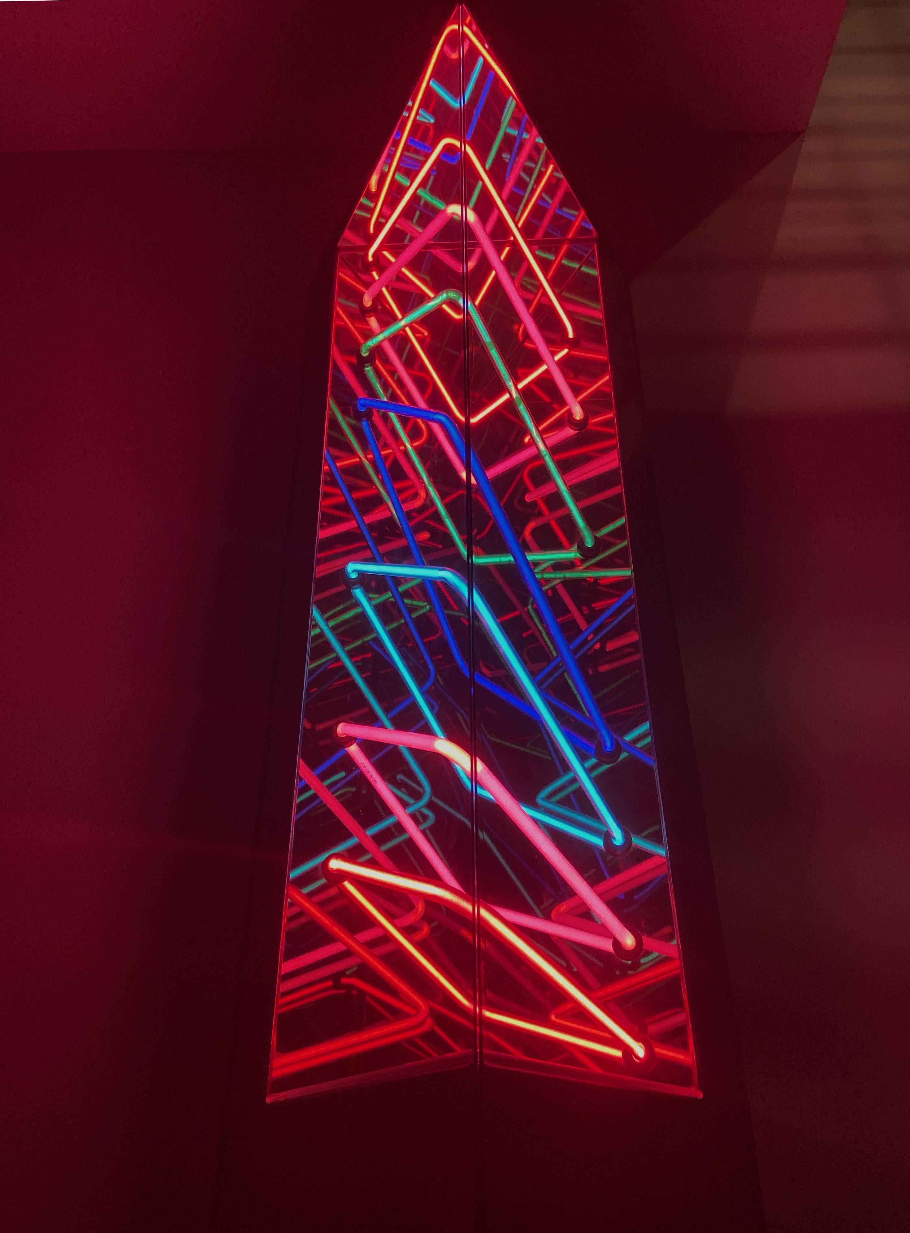 A large and impressive 1980s neon sculpture designed by Zimmerman Studios and produced by Archigraphics LA in 1987. Comes complete with pedestal as shown. Signed and numbered.