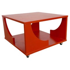 Mid century Post modern square red coffee table on casters made in Italy