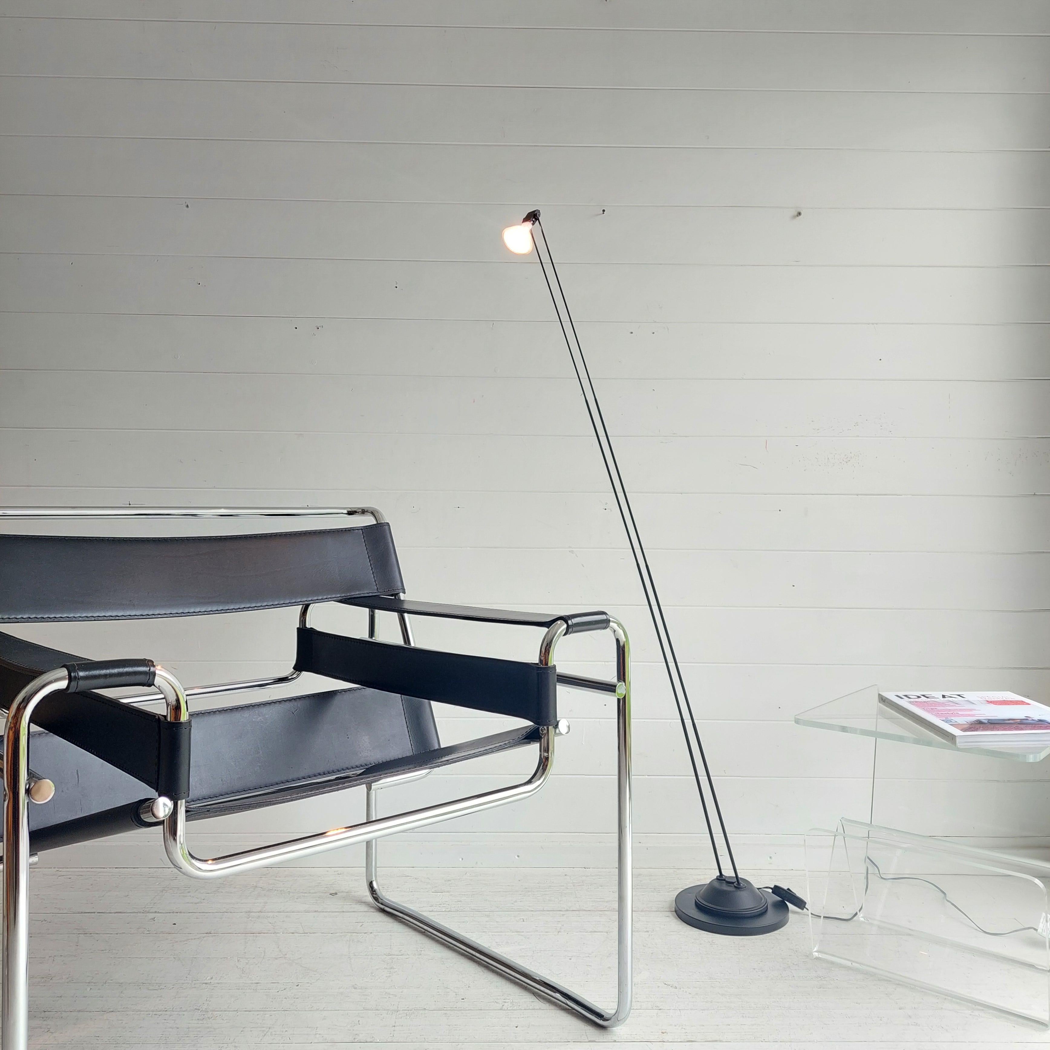 IKEA telescope  Halogen lamp.
Really a functional and minimalist lamp with very flexible adjustment options. 
Large or small, vertical or inclined and or twisted 
Even the head of the lamp can be tilted.

The minimalist sleek design suits every