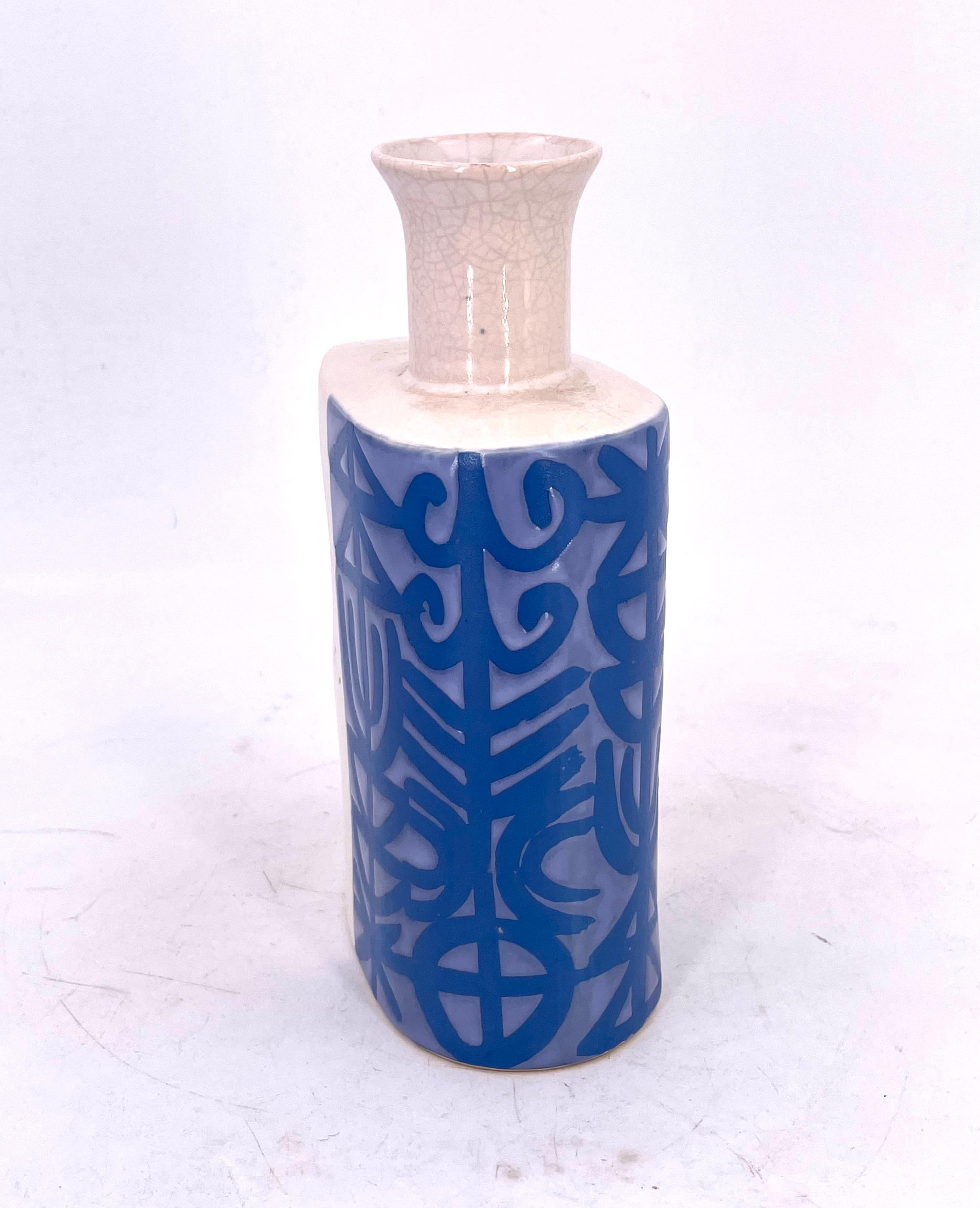 Beautiful ceramic vase with blue designs motifs, circa 1980s residual of label Made in Japan no chips or cracks.