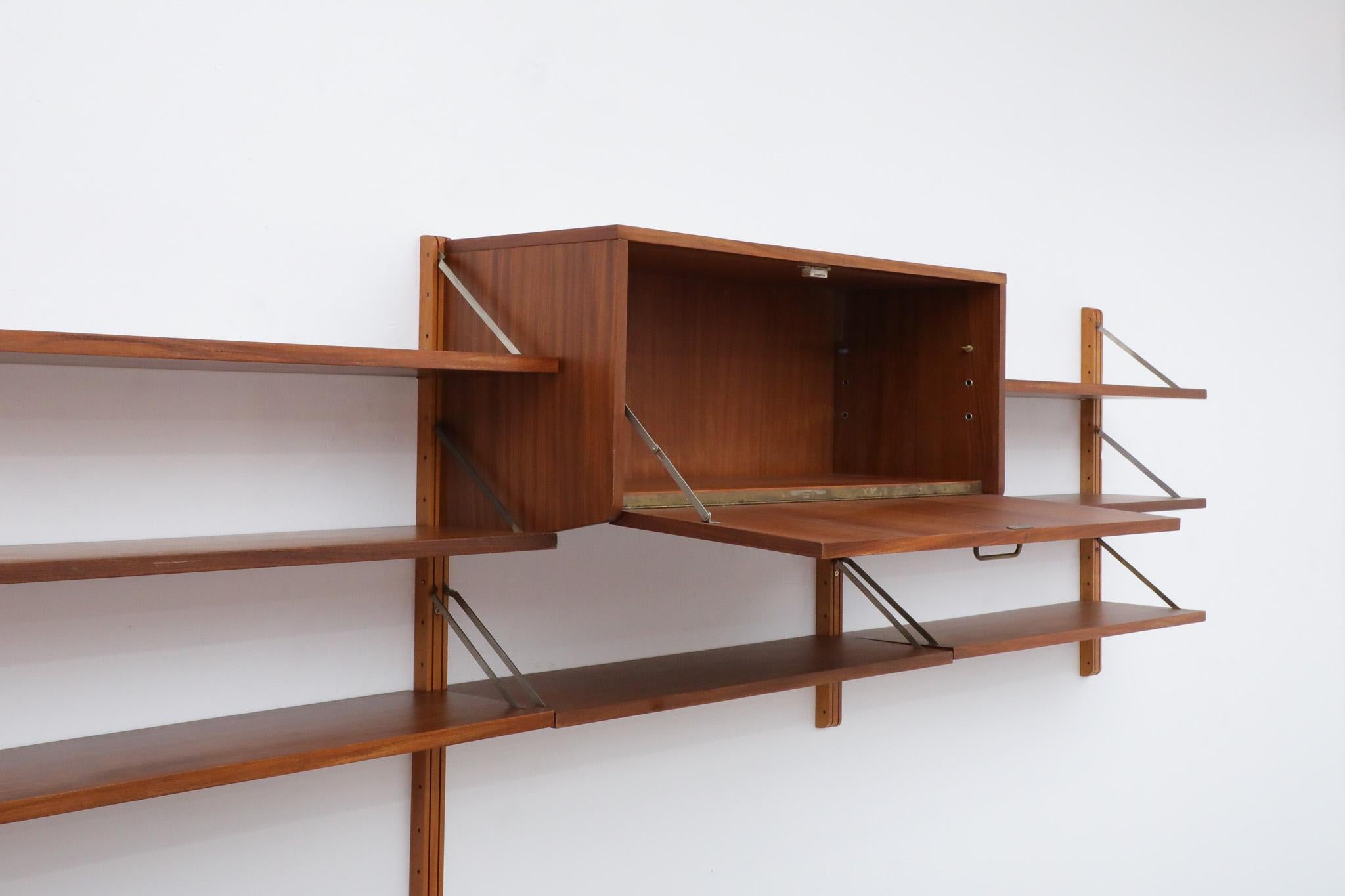 Mid-Century Poul Cadovius Inspired Italian Wall Shelving Unit In Good Condition In Los Angeles, CA