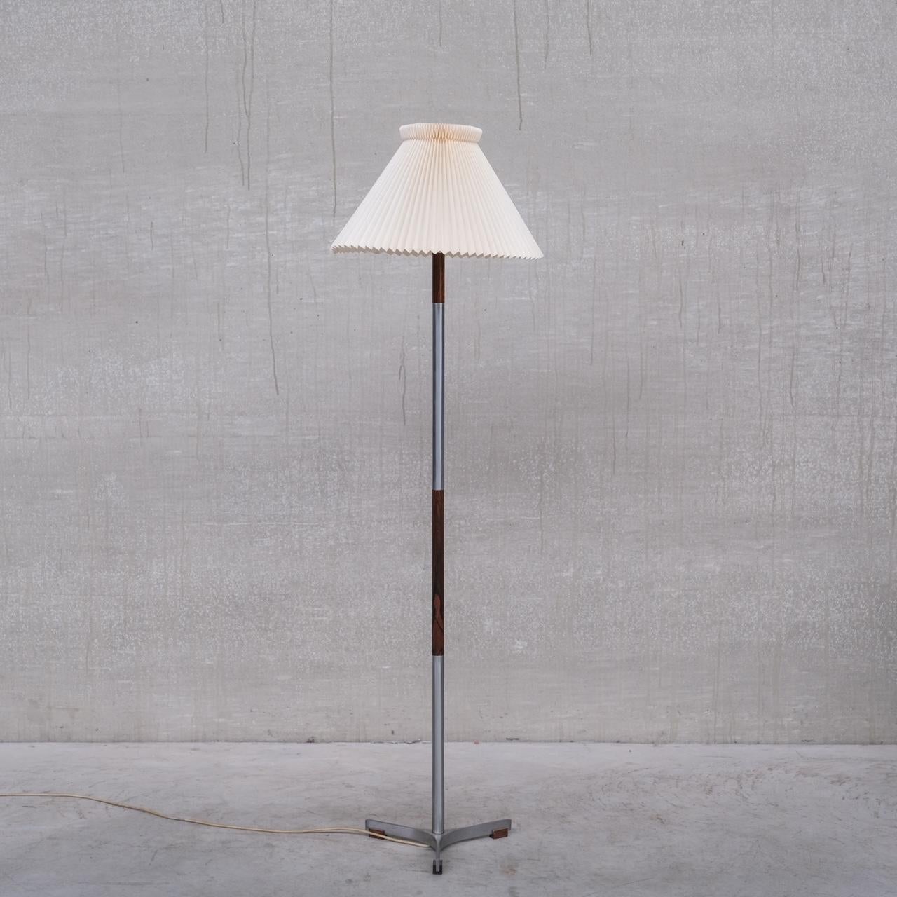 A metal and wooden floor lamp by Jo Hammerborg. 

Denmark, c1960s. 

'President' model. 

Original shade retained, a little worn so may want replacing. 

Since re-wired and PAT tested. 

Good vintage condition. Some scuffs and wear