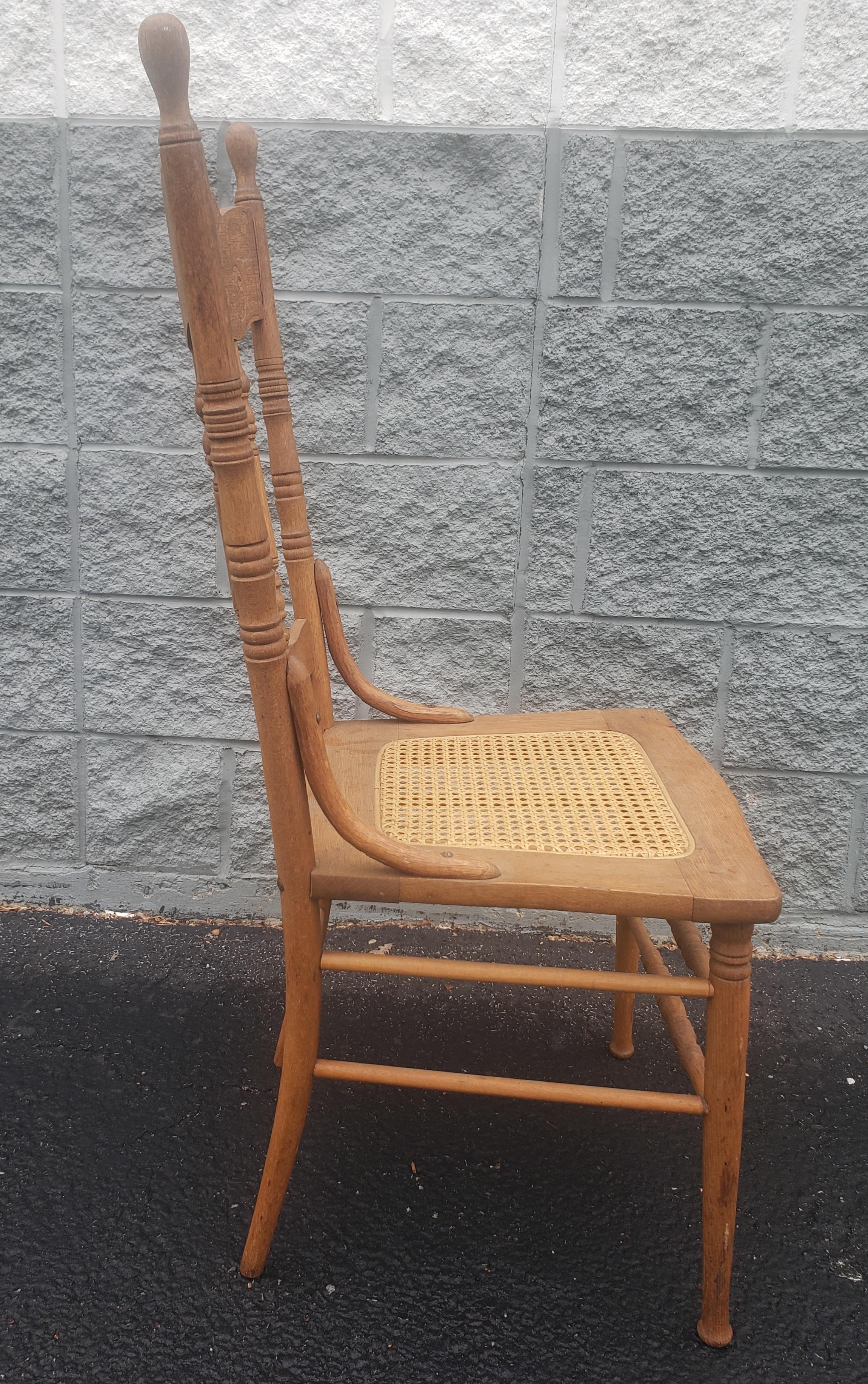Midcentury pressback spindle oak country chair. High back. 
Measures 18