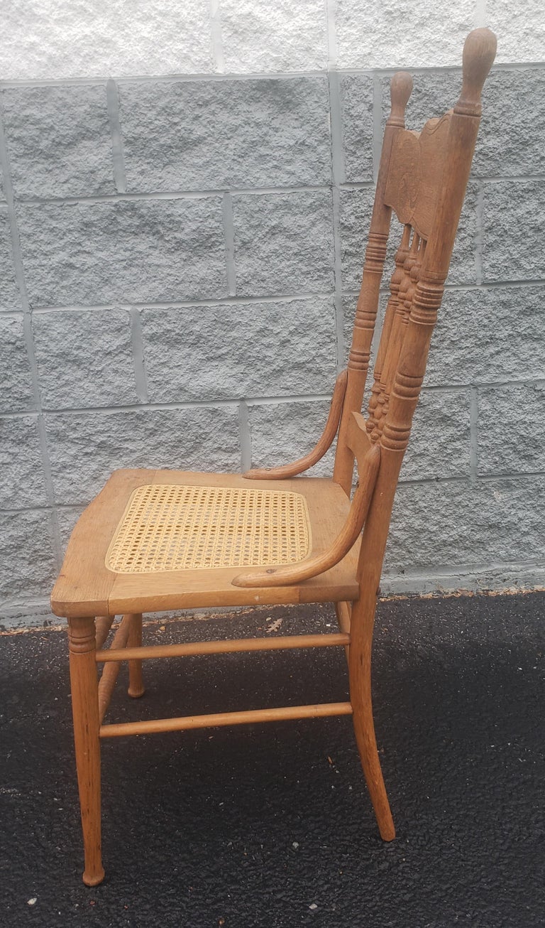 Midcentury Pressback Spindle Oak and Cane Country Dining Chair For Sale