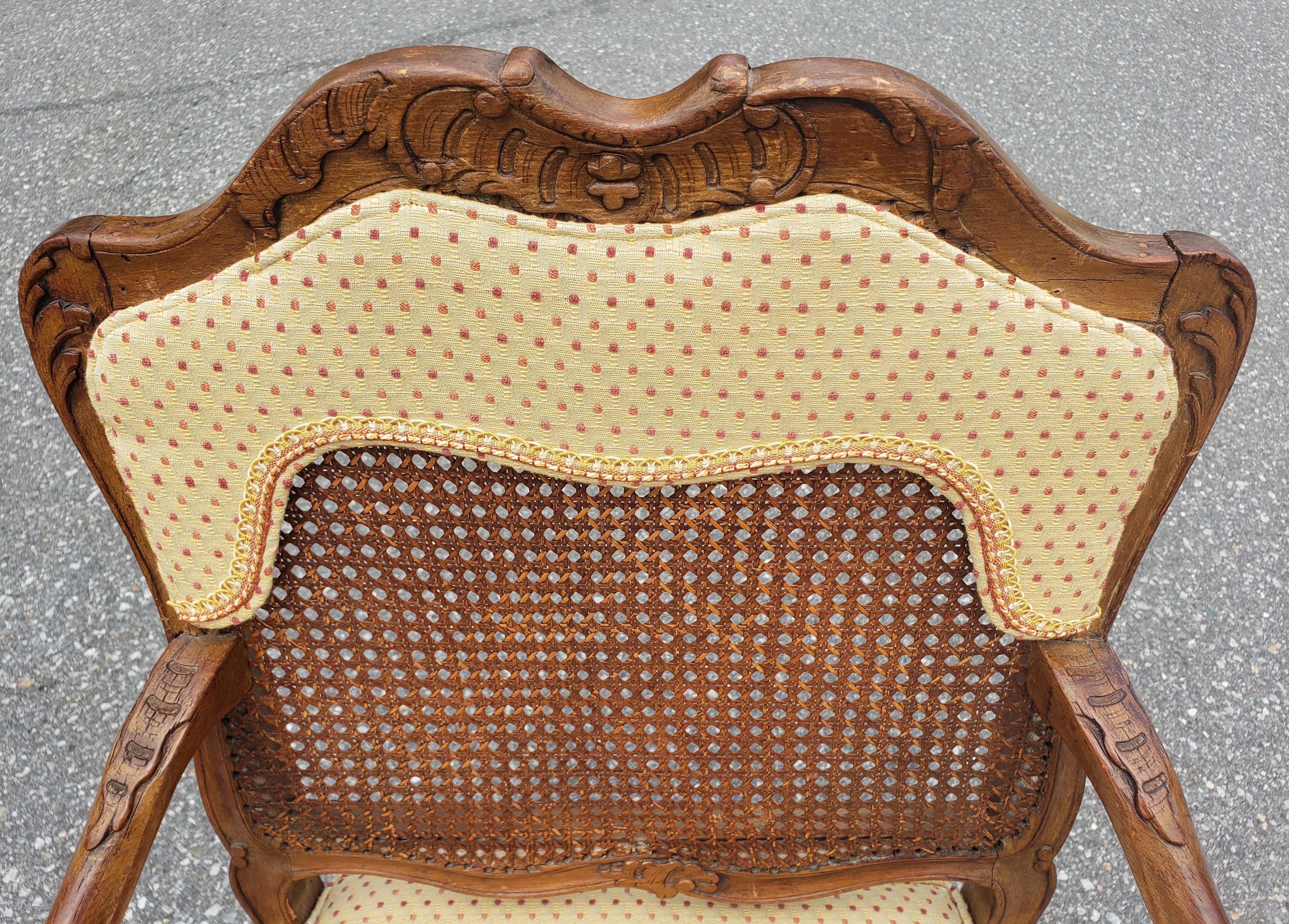 Upholstery Mid-Century Provincial Carved Fruitwood Cane And Custom Upholstered Armchair For Sale