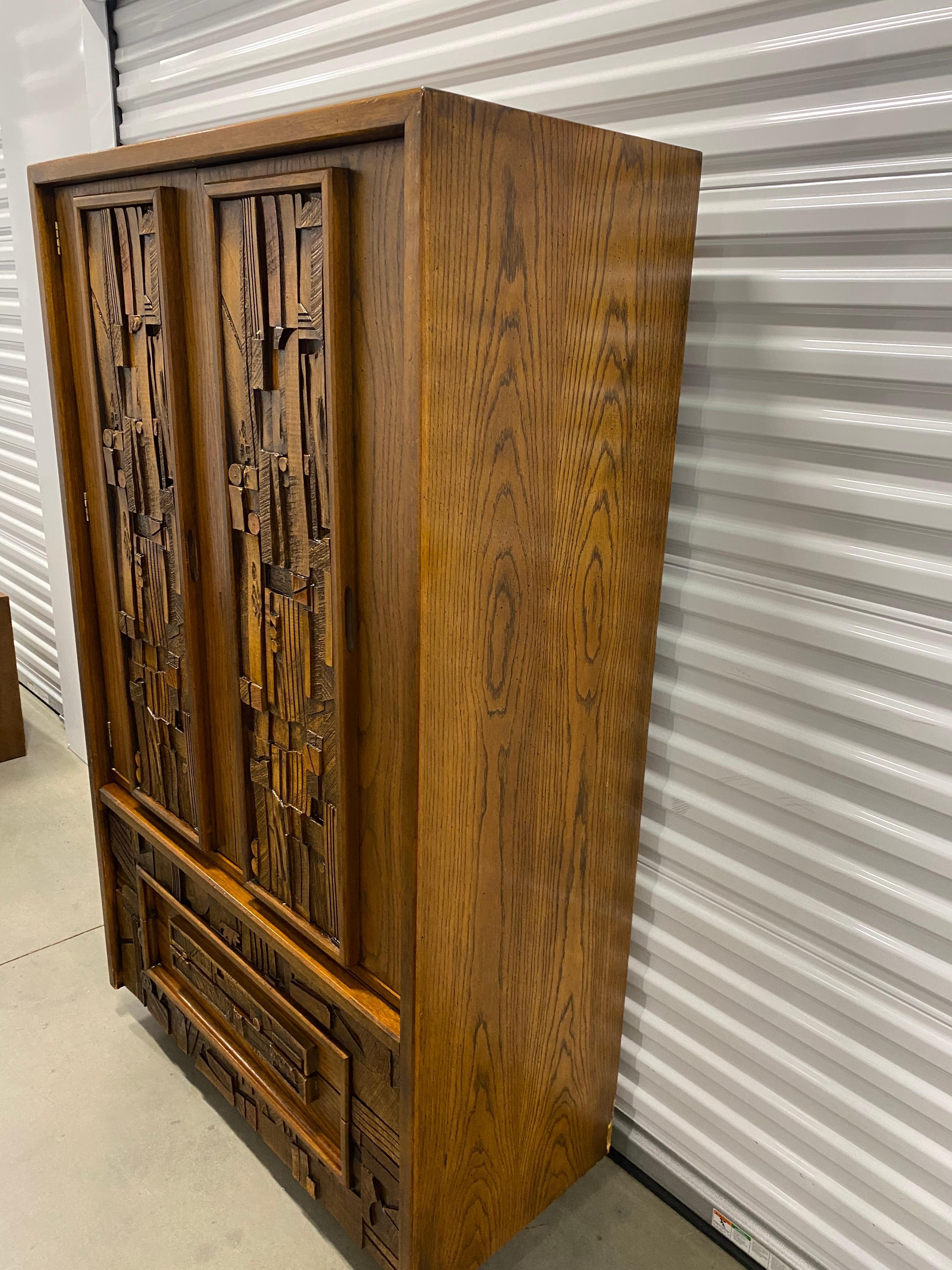 Gorgeous mid-century brutalist armoire. From the “Pueblo” collection. Stunning architect. Very structurally sound. Good vintage condition.