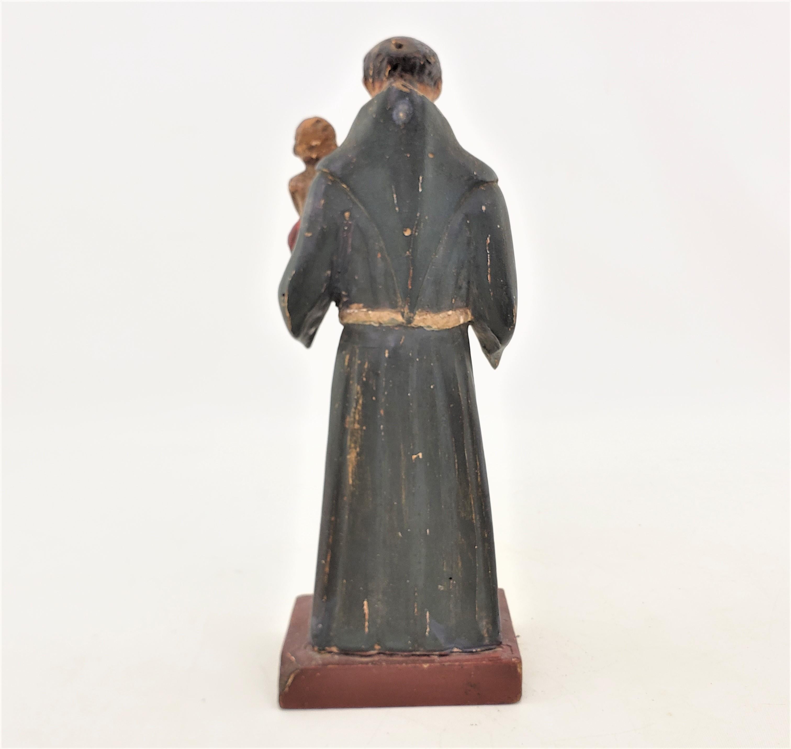 Mid-Century Quebec Folk Art Carved & Polychrome Pahined Robed Clergyman & Child  In Good Condition For Sale In Hamilton, Ontario