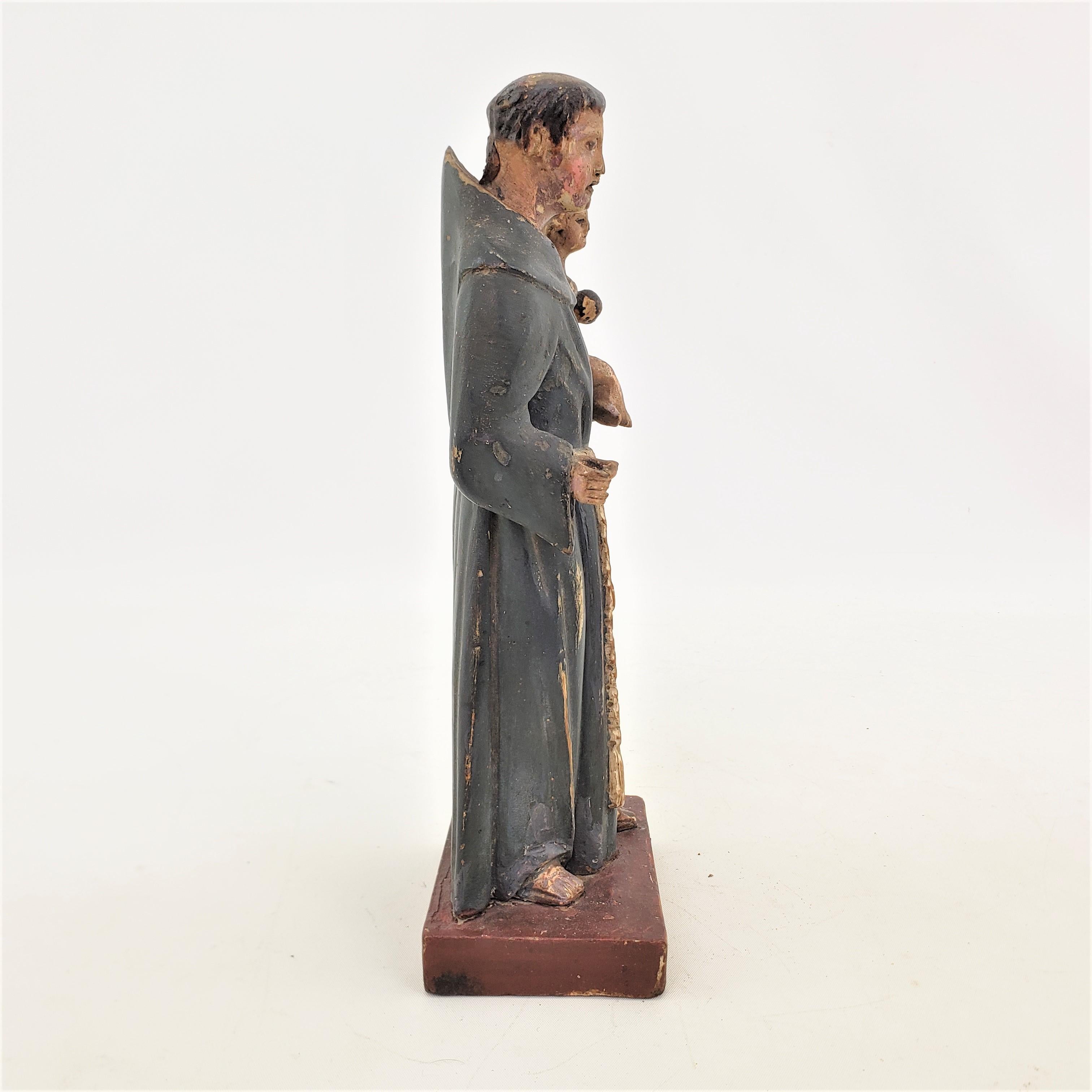 20th Century Mid-Century Quebec Folk Art Carved & Polychrome Pahined Robed Clergyman & Child  For Sale