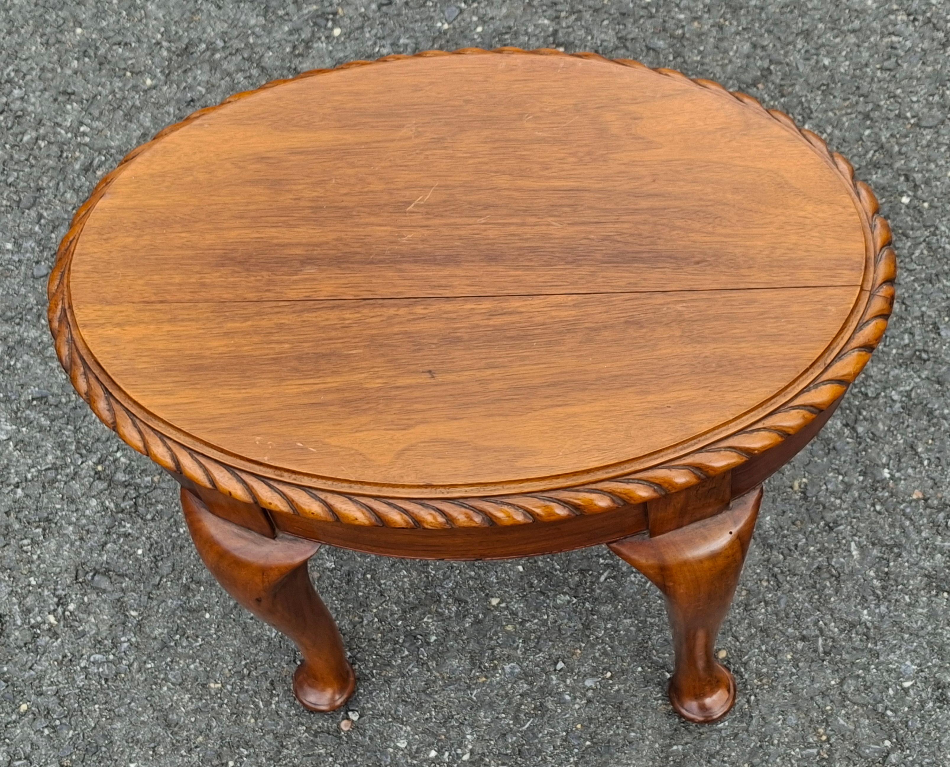 An Early 20th Century Maddox Colonial Queen Anne Style Stained Mahogany and Upholstered Stretcher Bench
MEASUREMENTS: 15″ wide x 10