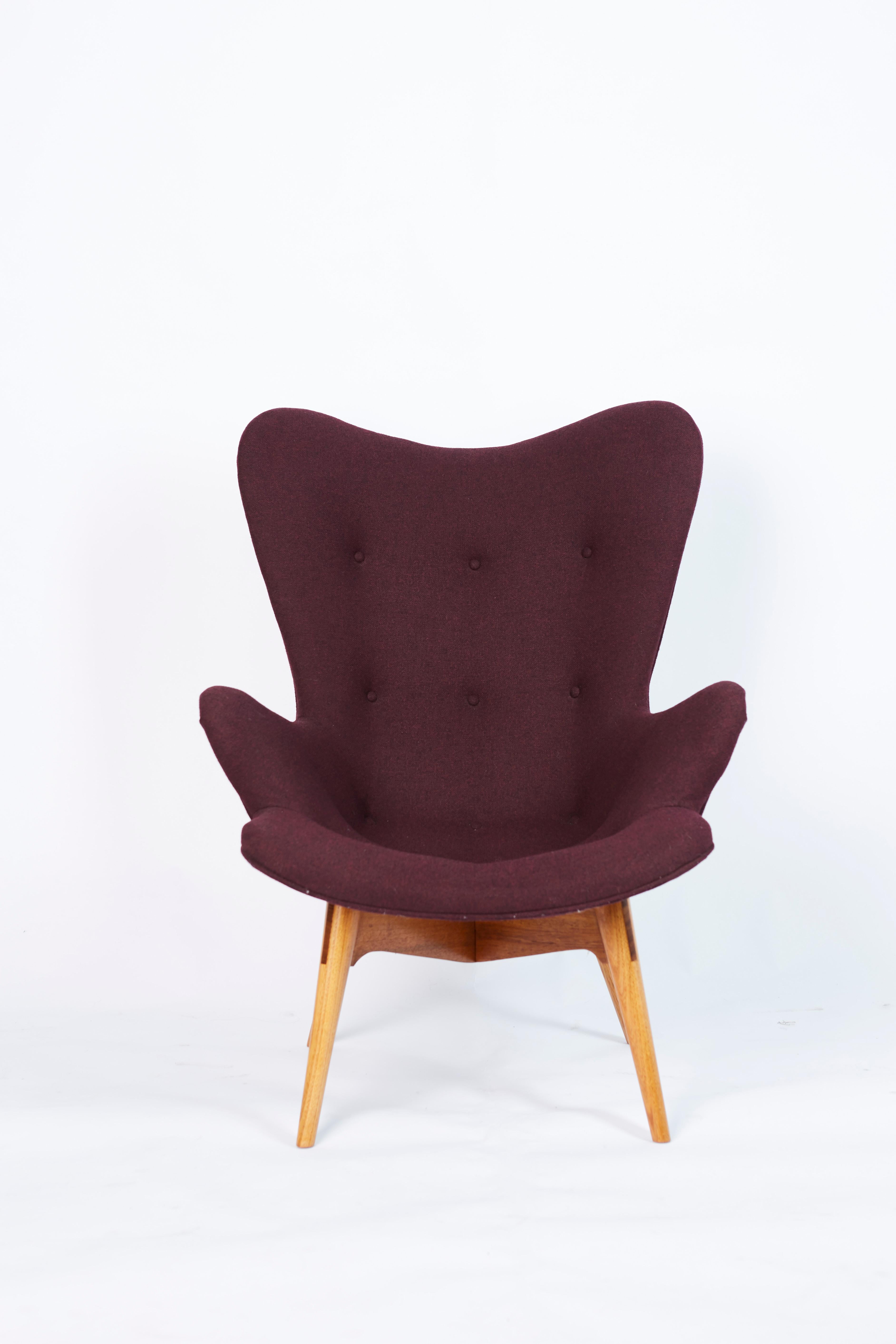 R160 contour chair by Grant Featherston completely restored. The base still retains the original stamp. Chair constructed with the back and seat shaped in one single curved piece. The back is high with slightly winged sides. The seat is a slightly