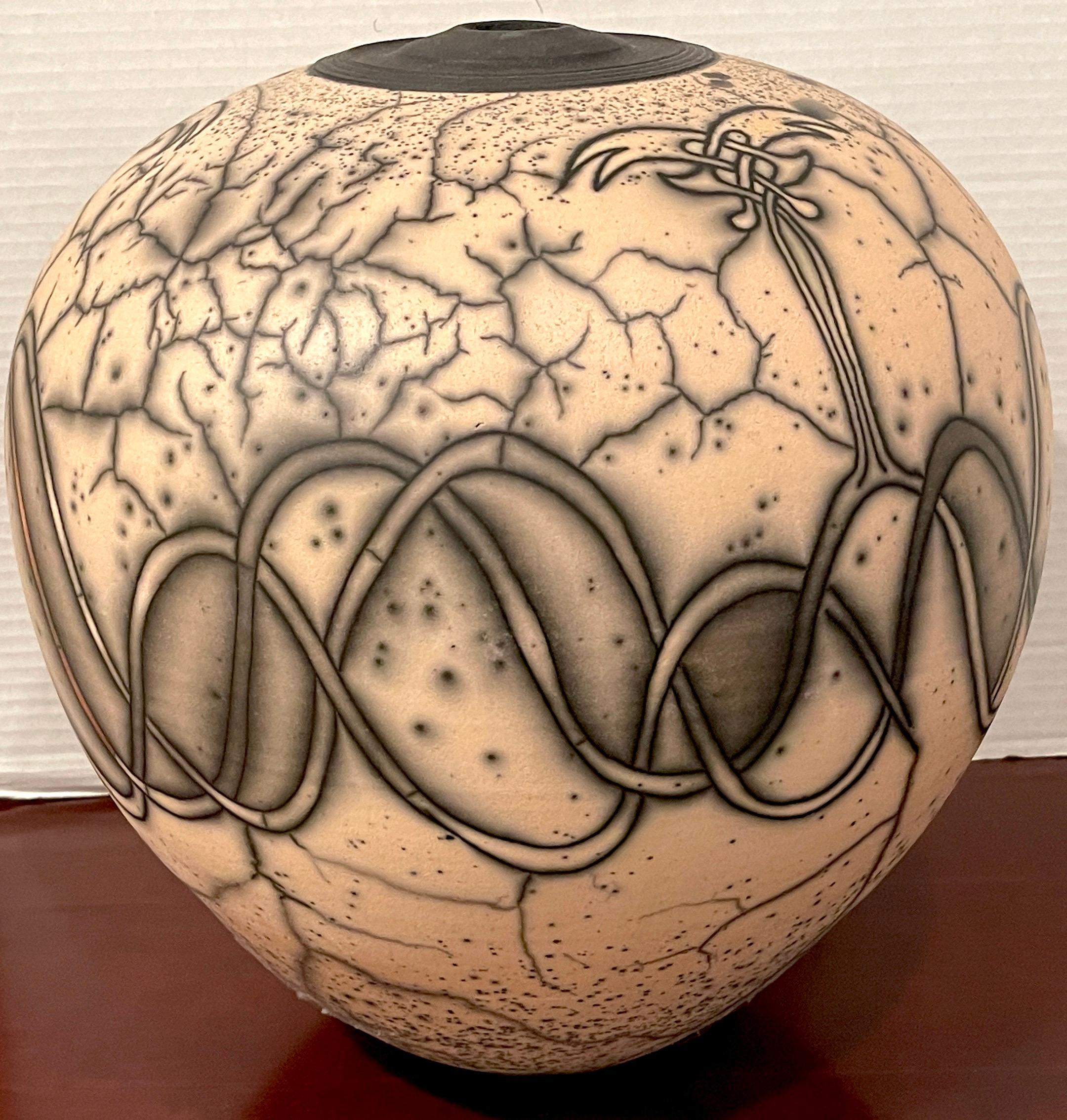 Mid-century Raku pottery vase, Signed Jacobson, a large well decorated example, signed and dated 'Jacobson 5/91'
The vase has a 5