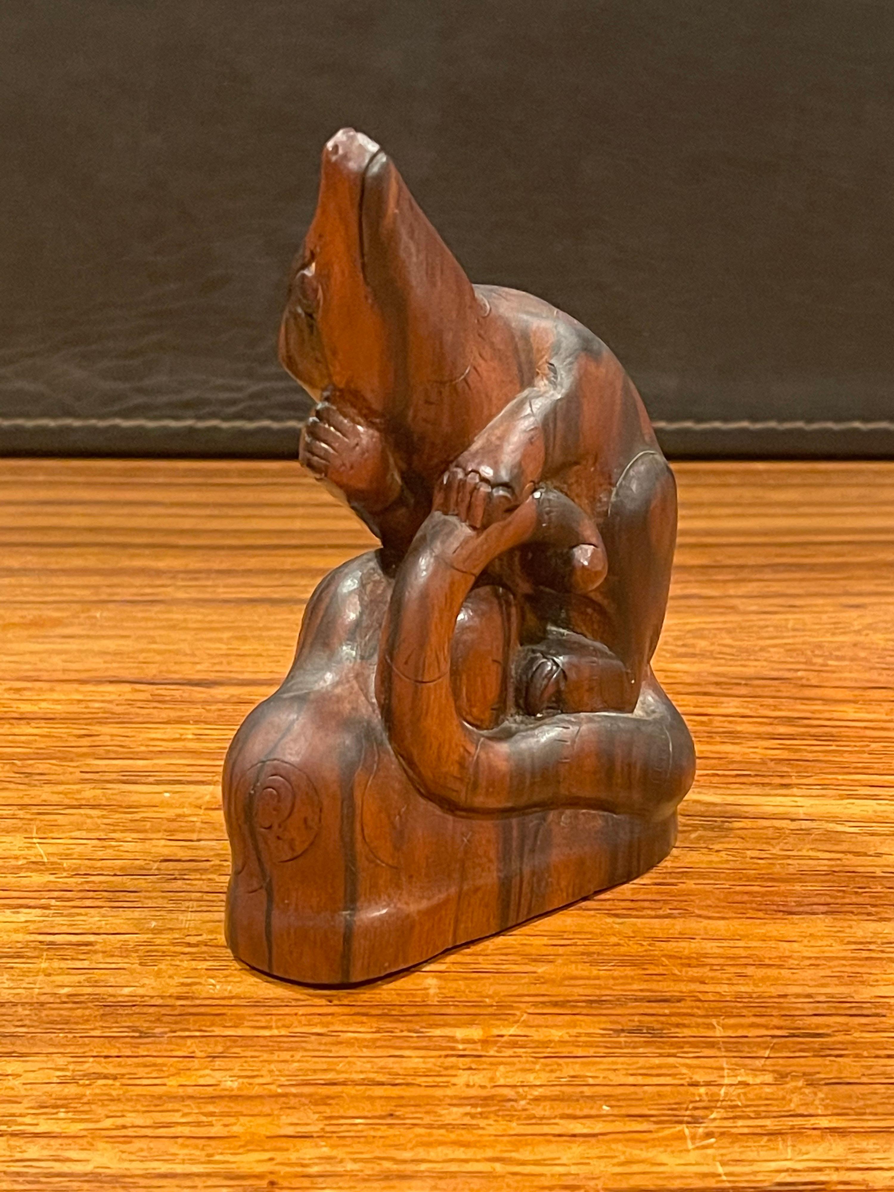 A very cool mid-century rat / rodent carving / sculpture in rosewood, circa 1970s. The piece measures 2.5