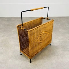 Mid Century rattan and black metal magazine rack, 1950's