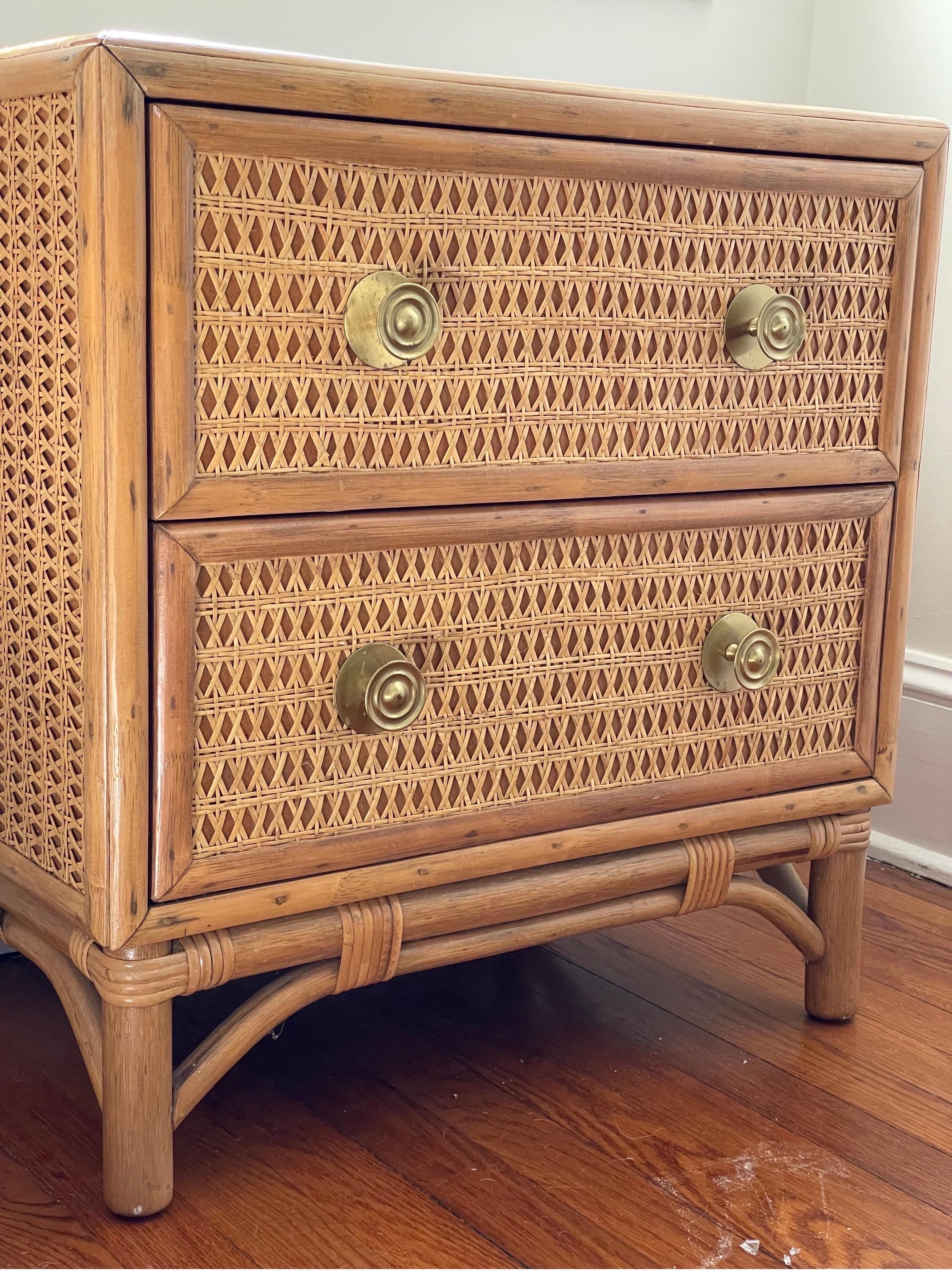 Wonderful rattan and cane nightstand or side chest of drawers with brass pull. Coastal chic with great contrasting of rattan frame and cane accent. Glass top for smooth surface protection. Sturdy and heavy.
Can deliver to NYC/Philly $300
see other