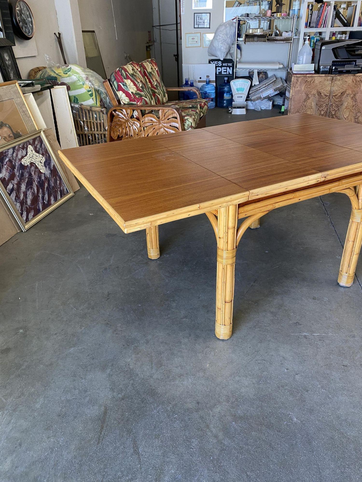 Mid Century Rattan and Mahogany Expandable Dining Table w/ Leaves In Excellent Condition For Sale In Van Nuys, CA