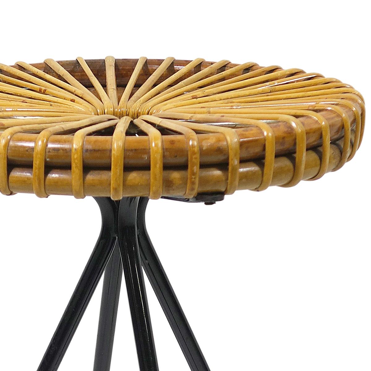 This stylish almost graphic stool has a black lacquered steel frame and a seat made of rattan. It was designed by Dirk van Sliedregt in the 1950s and still is a powerful eye catcher today. Moreover it is remarkably comfortable to sit at.