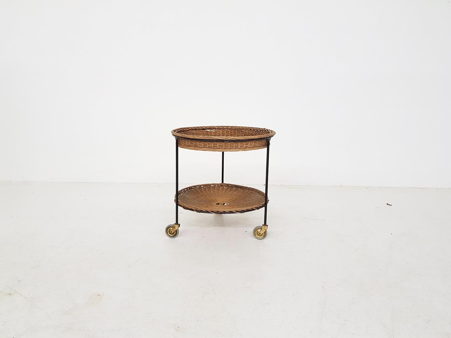 Nice matching set of 2 midcentury rattan and metal trolleys or bar carts. Probably made by Artimeta or Dirk Van Sliedrecht and Rohe Noordwolde. But they have also a lot resemblances to Mathieu Matégot. They are from the 1960s and probable made in