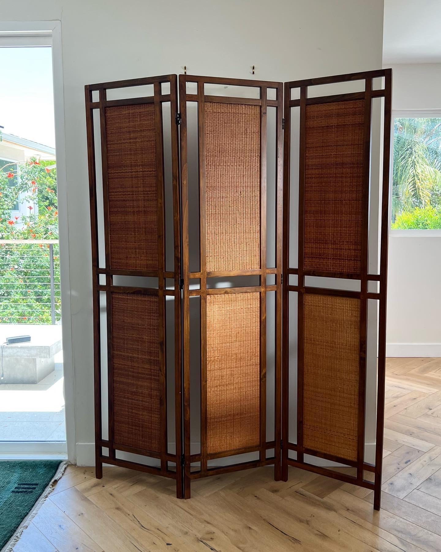 A mid century room divider in rattan and teak, 1960s. Minor signs of age (as shown in photos) but overall fabulous vintage condition. Pick up in LA or worldwide shipping available.
Dimensions: 
54” W x .8” D x 70” H
Each panel: 18” W.