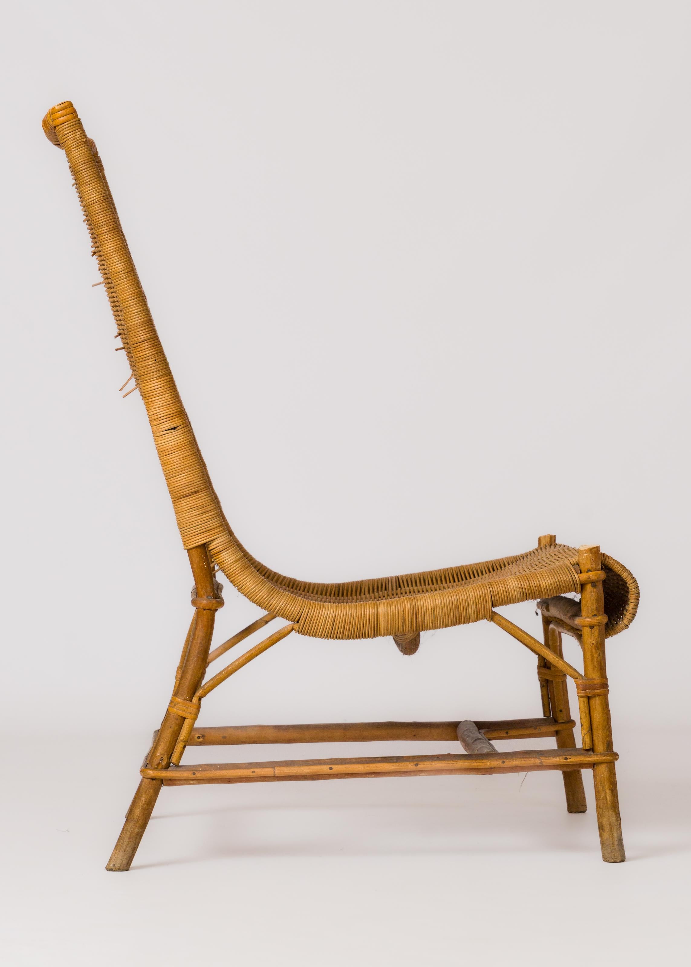 Silla Slipper de ratán y mimbre de mediados de siglo - Francia Años 60 en Bueno estado para la venta en New York, NY