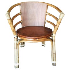 Vintage Mid-Century Rattan Barrel Back Armchair with Skeleton Arms