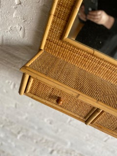 Specchio da parete di metà secolo in rattan e canna con cassetti, Italia, anni '70