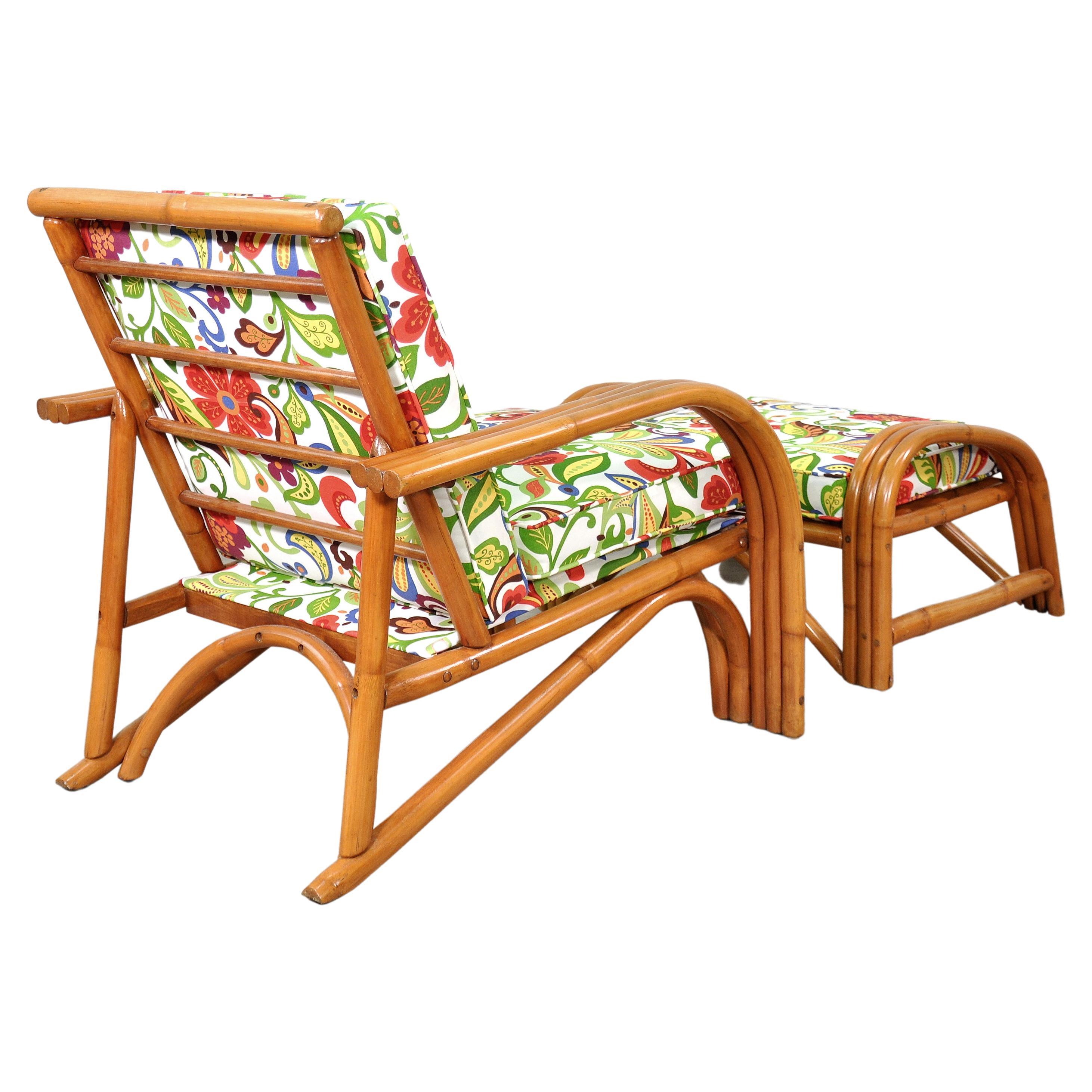 Newly restored and reupholstered vintage three-strand rattan armchair and footstool dating from the late 1940s to early 1950s. The removable cushions have been reupholstered in a Josef Frank style indoor/outdoor performance fabric. The bentwood and
