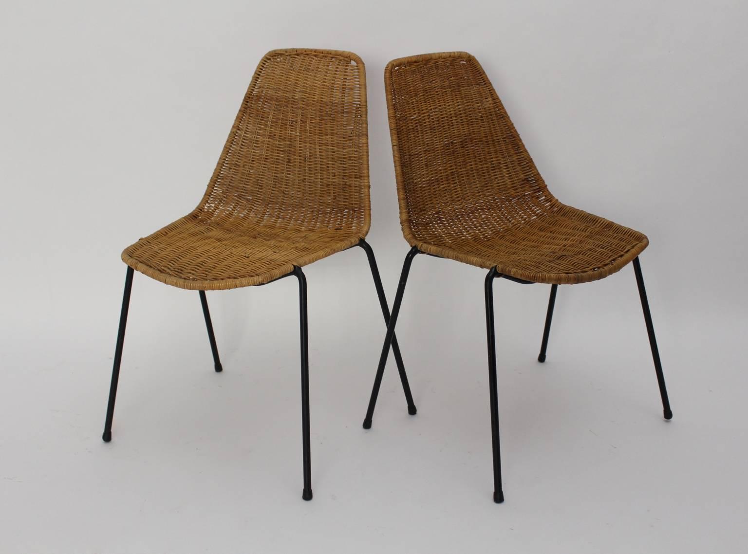 Mid Century Modern set of two chairs from rattan designed by the Swiss designer Gian Franco Legler 1951 for the Italian Restaurant 