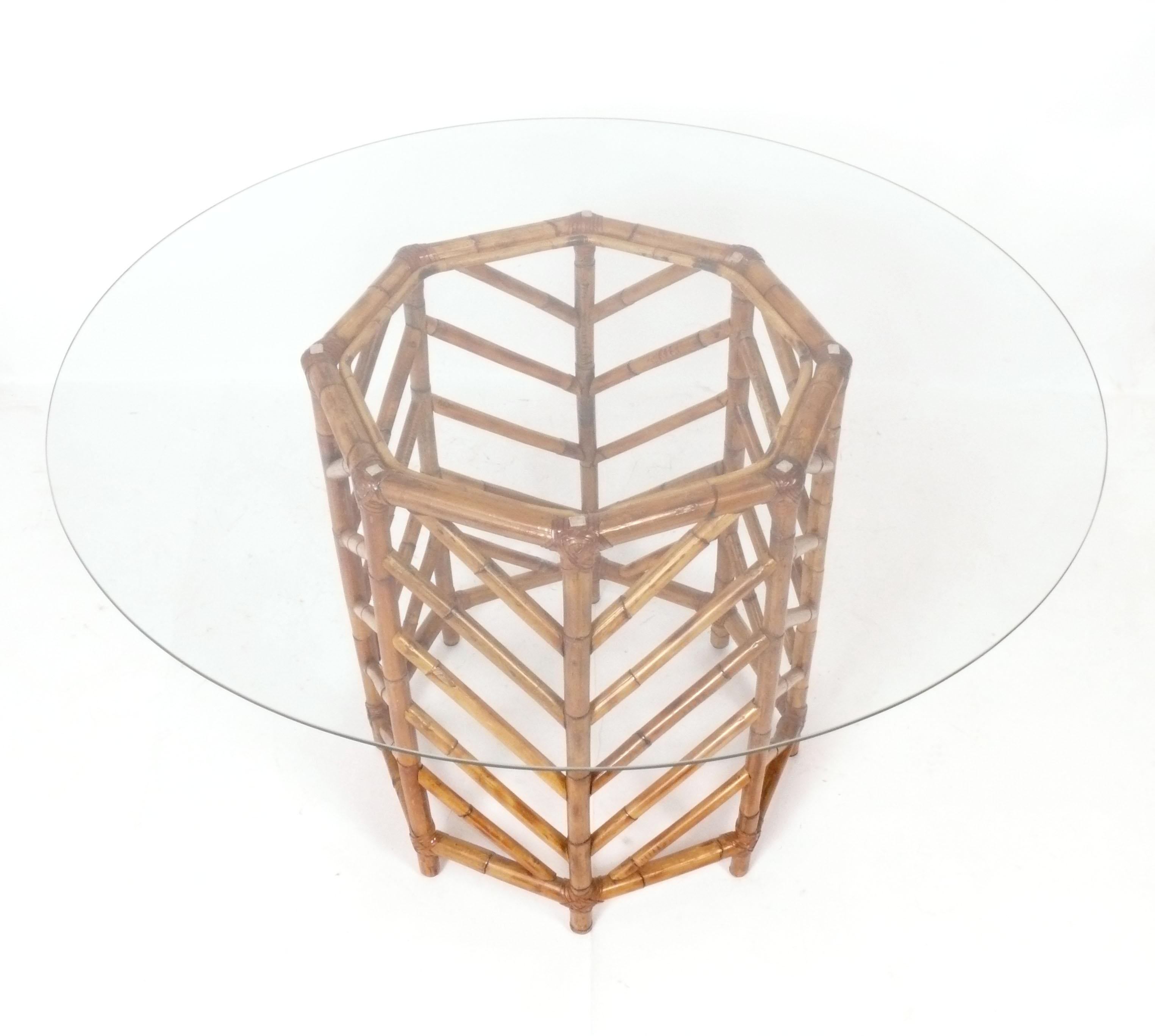 Mid Century Rattan Dining Table, attributed to The McGuire Company, Asian, circa 1960s. Please see our Gabriella Crespi dining chairs on 1stdibs that would work well with this table. The table base itself measures 29.5