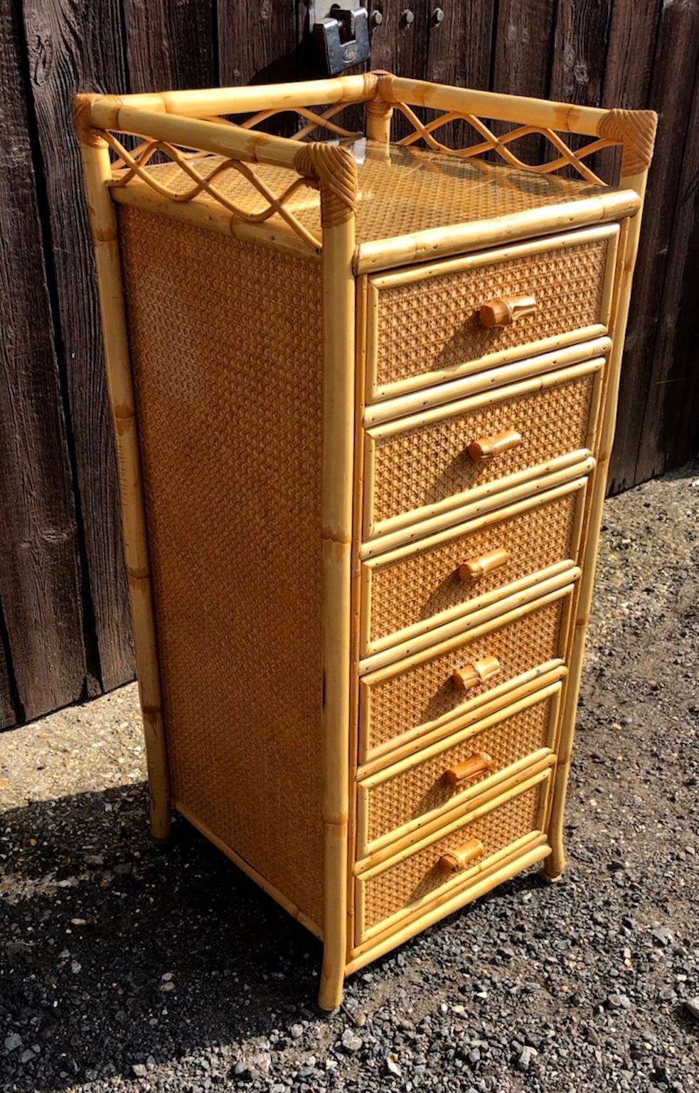 Midcentury rattan / bamboo highboy / tallboy, chest of drawers by Angraves, England, 1970s

This is a beautiful, natural in color rattan Tallboy. Made by English company ‘Angraves’ of Brook St, Leicester, part of their “Invincible” range.

The
