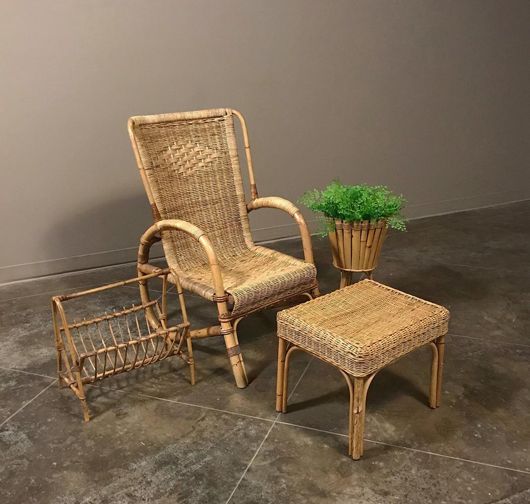 Midcentury rattan lounge chair and footstool by Huis Kenninck of Gent. Bears manufacturers original label. Great example of midcentury bamboo and rattan furniture constructed by hand with craftsmanship that is no longer the common norm. This