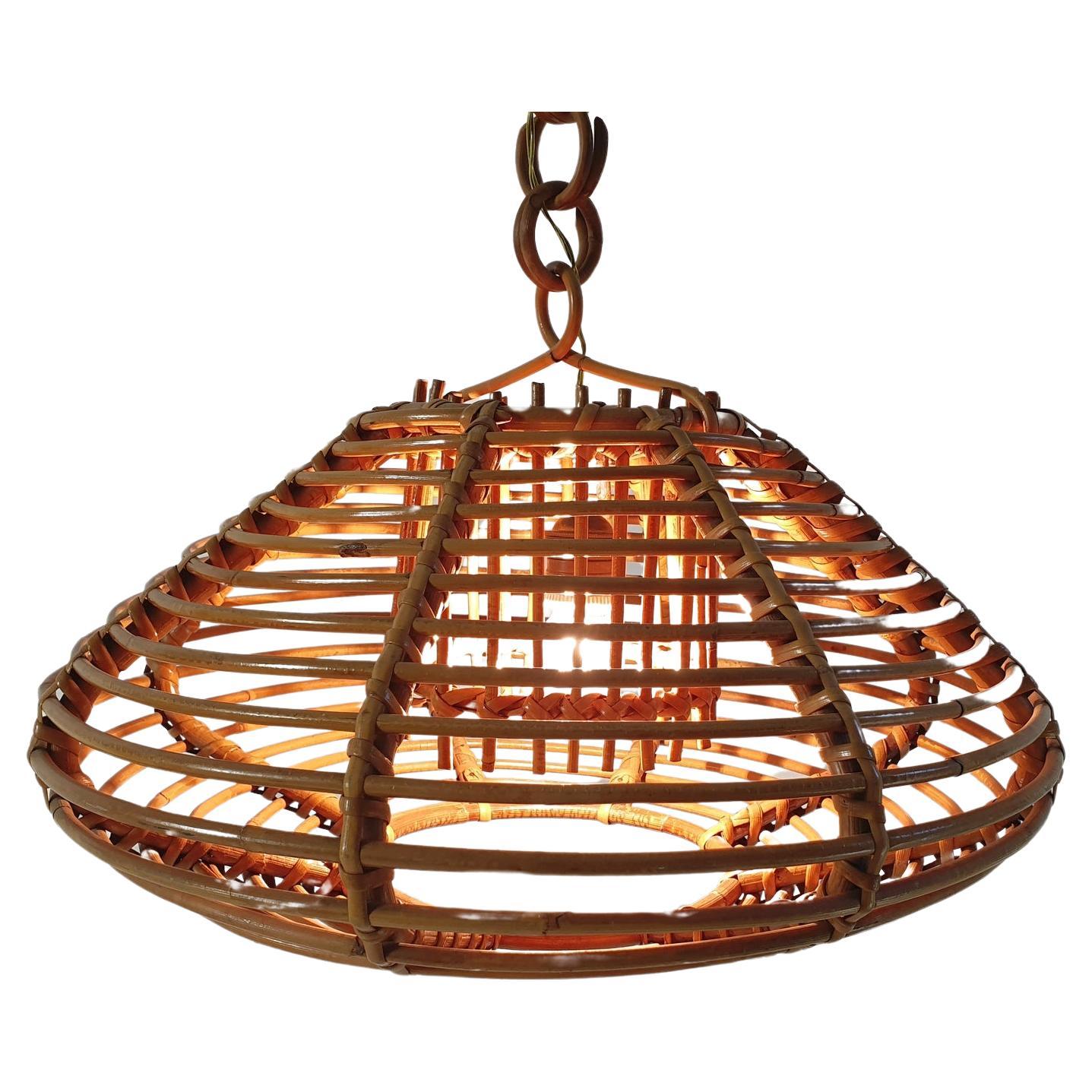 Midcentury Italian handmade rattan pendant in very nice original condition without damages and in very nice condition. Lightsource can be altered depending on what one prefers of course.
